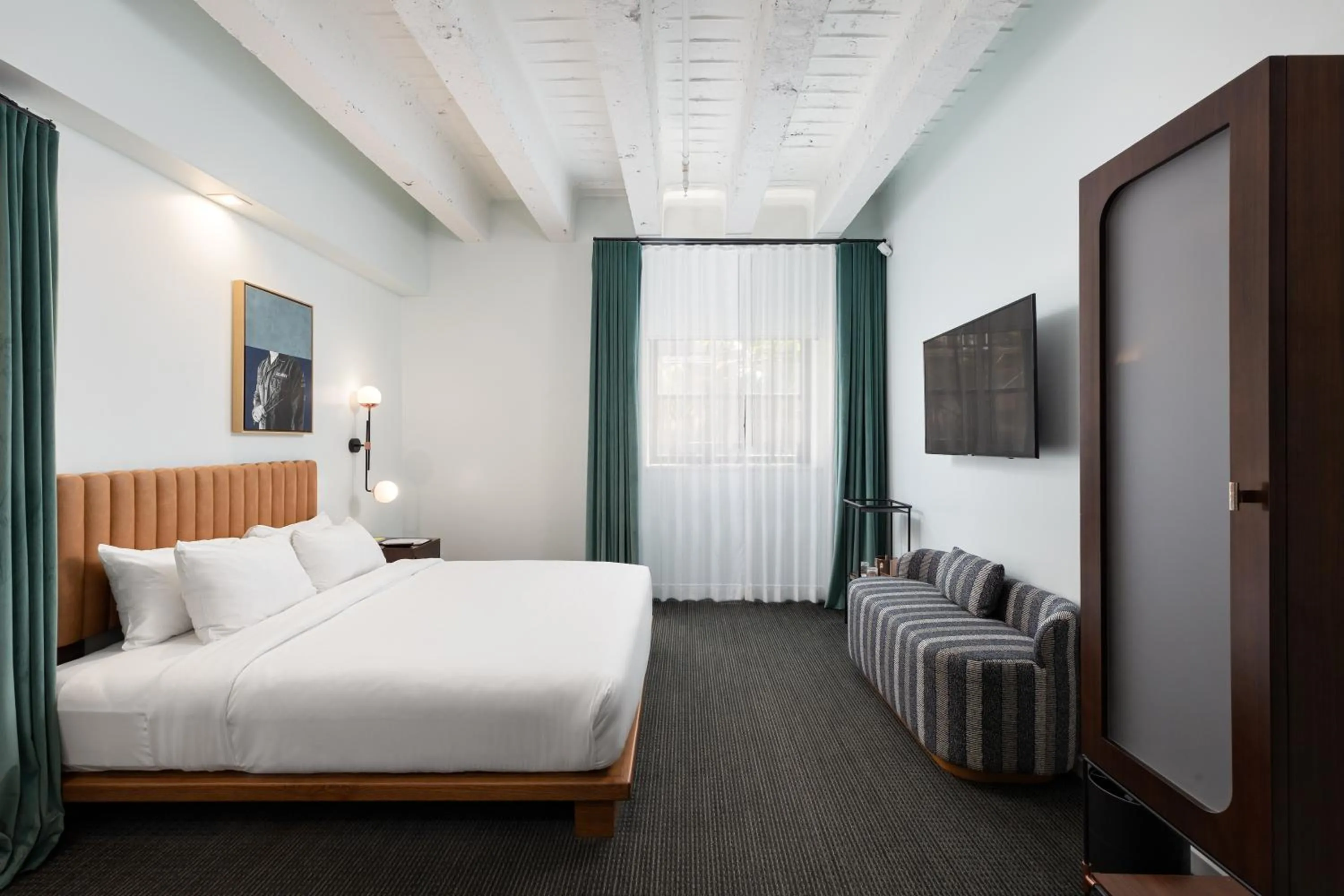 Bed in The Guild Hotel, San Diego Downtown, a Marriott Tribute Portfolio Hotel