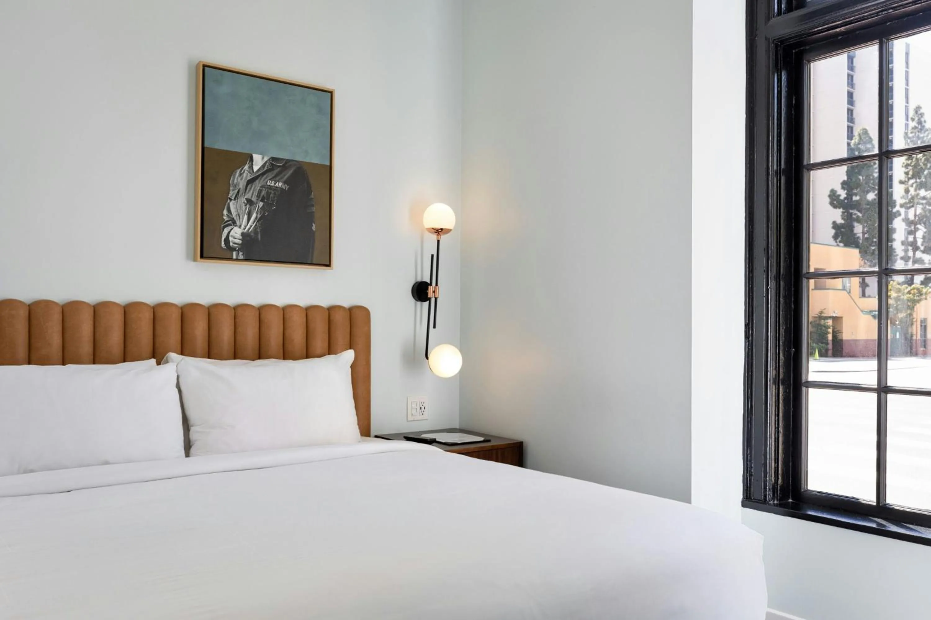 Photo of the whole room, Bed in The Guild Hotel, San Diego Downtown, a Marriott Tribute Portfolio Hotel