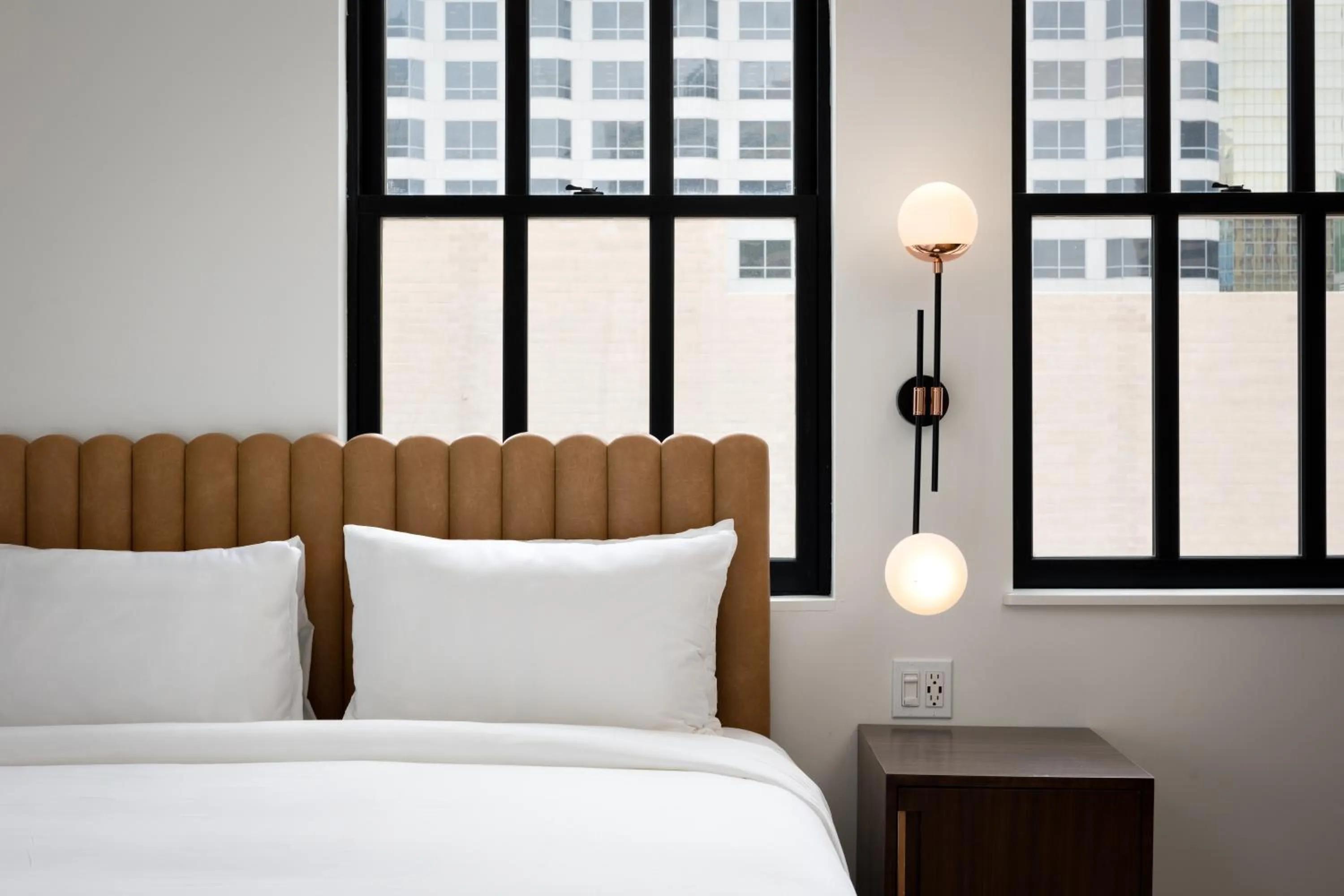 Bed in The Guild Hotel, San Diego Downtown, a Marriott Tribute Portfolio Hotel