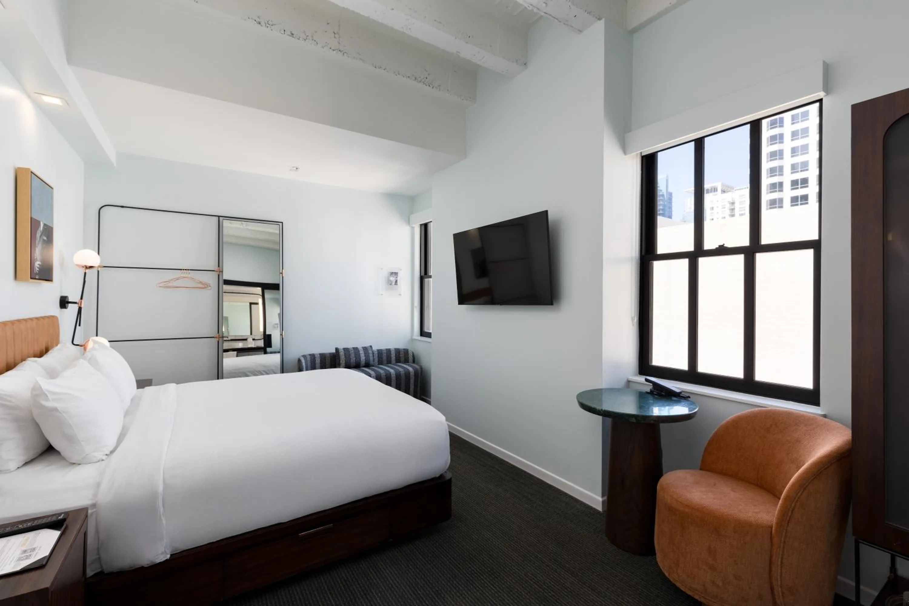 Bed in The Guild Hotel, San Diego Downtown, a Marriott Tribute Portfolio Hotel