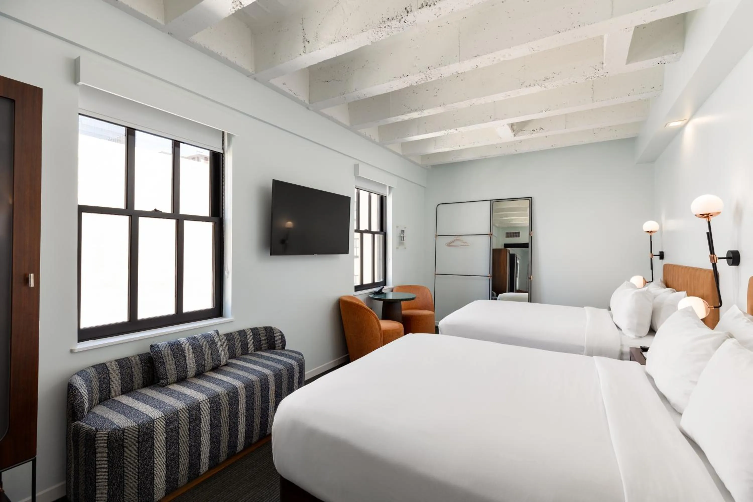 Bed in The Guild Hotel, San Diego Downtown, a Marriott Tribute Portfolio Hotel