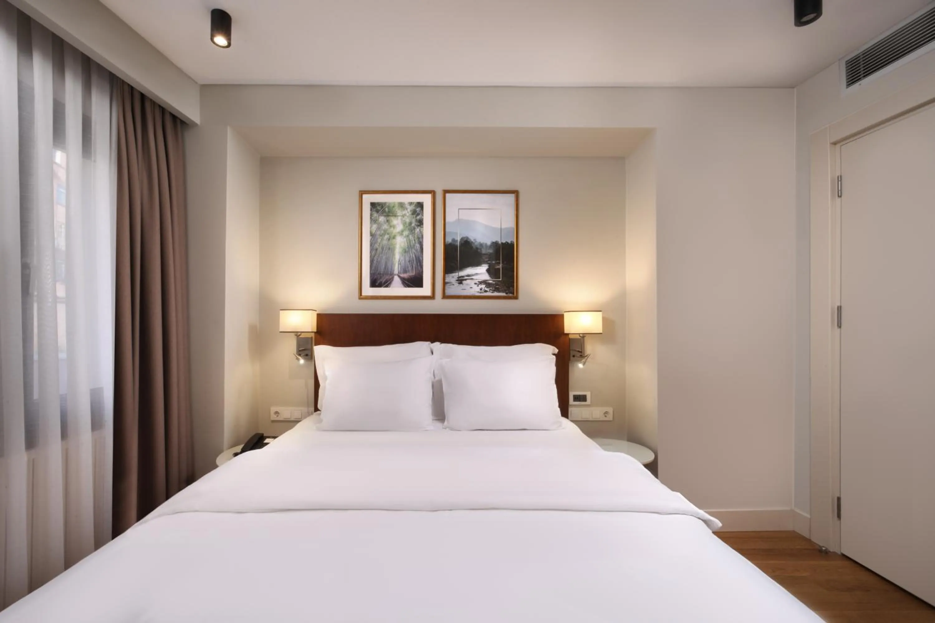 Bed in Suadhan Hotel