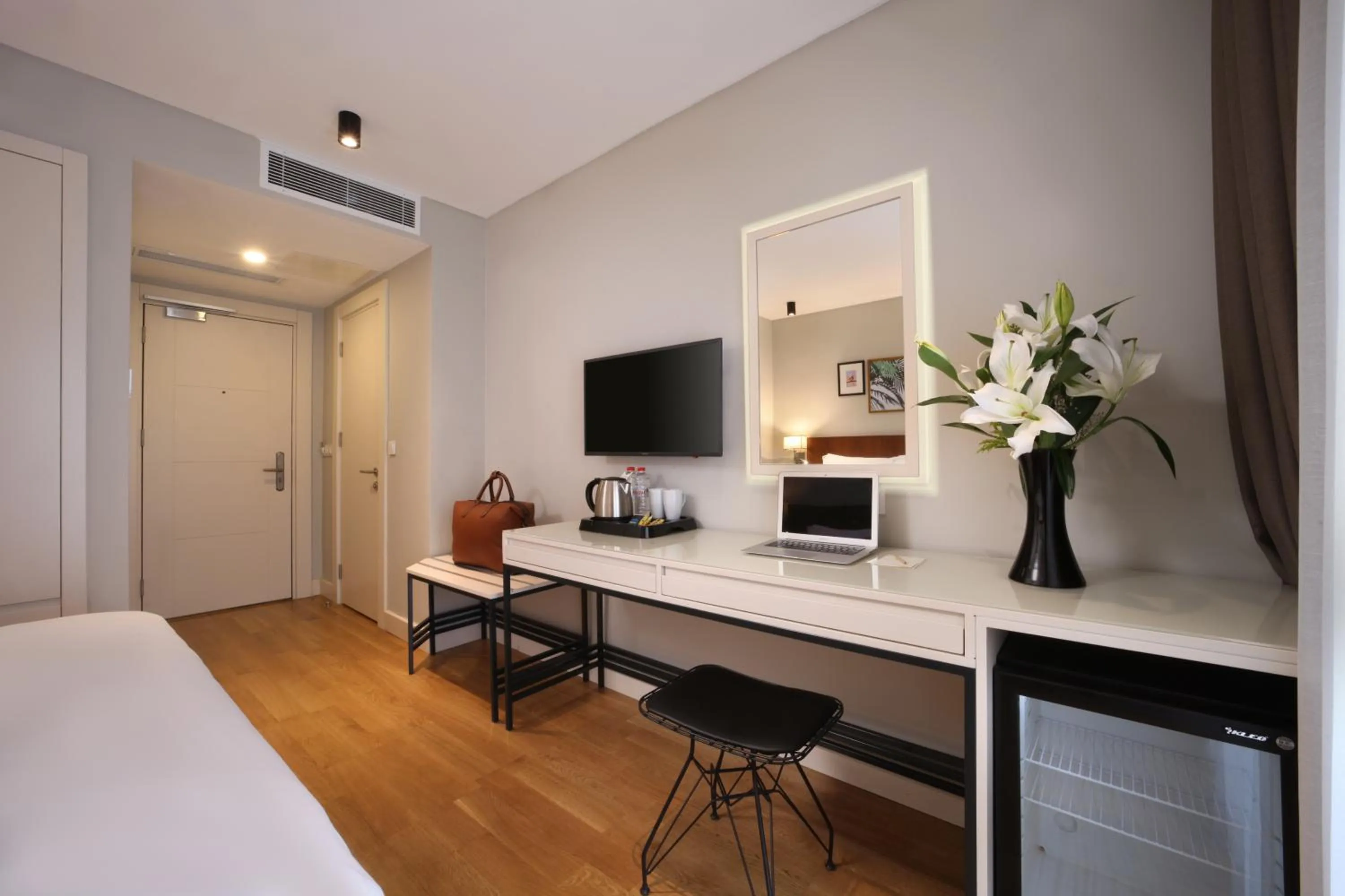 TV and multimedia, Bed in Suadhan Hotel