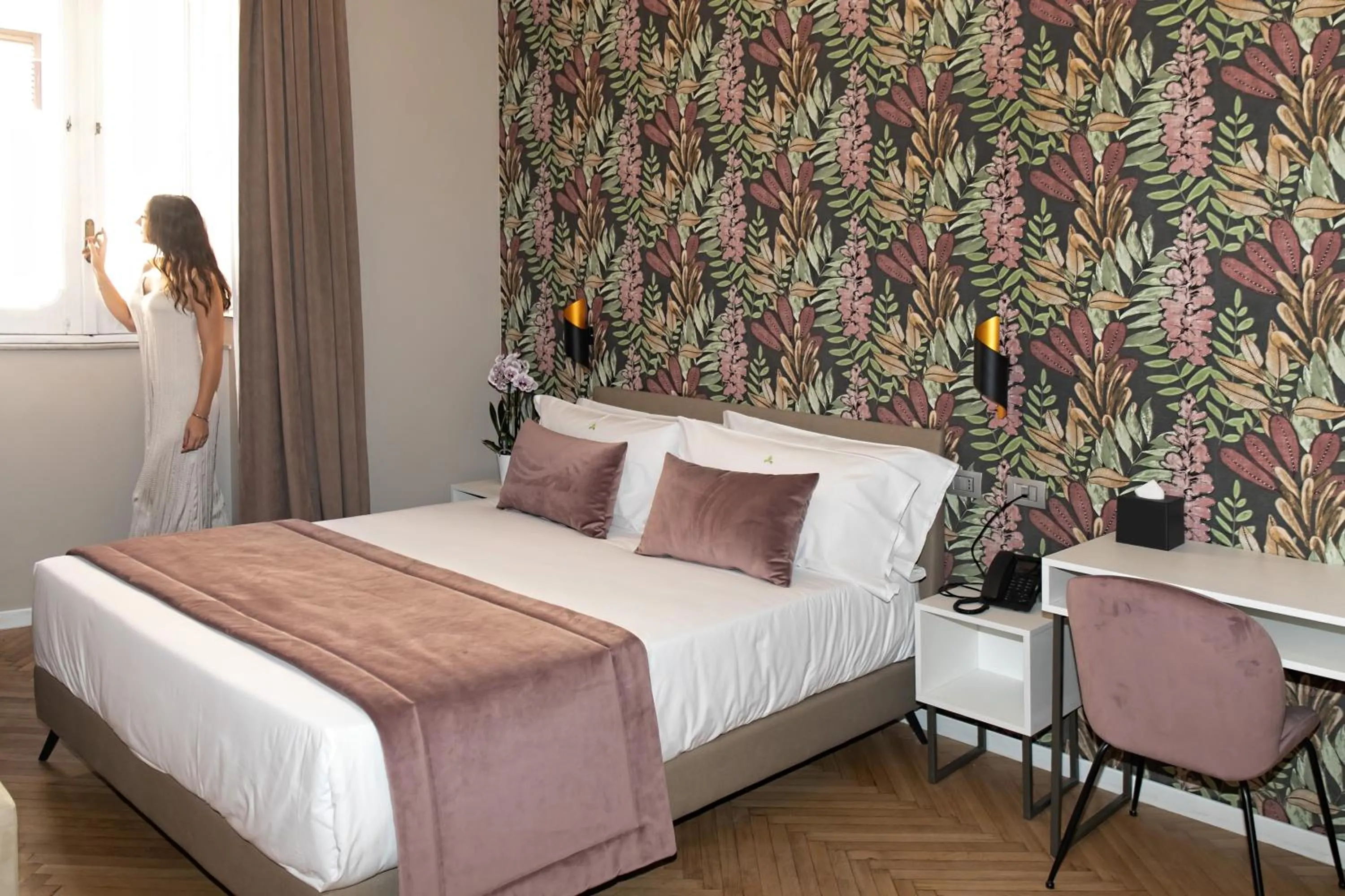 Bed in Hotel Caravita