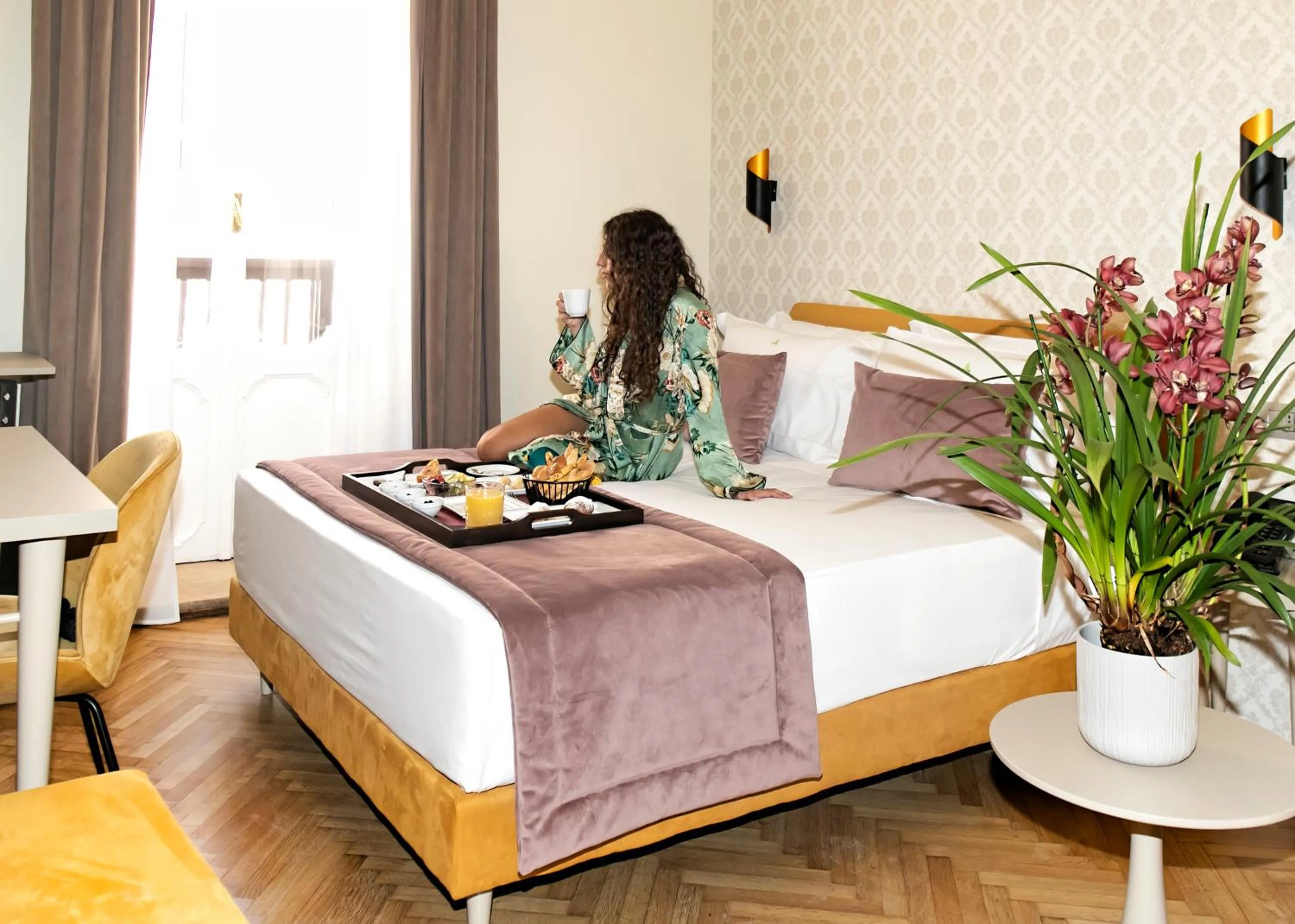 Bed in Hotel Caravita
