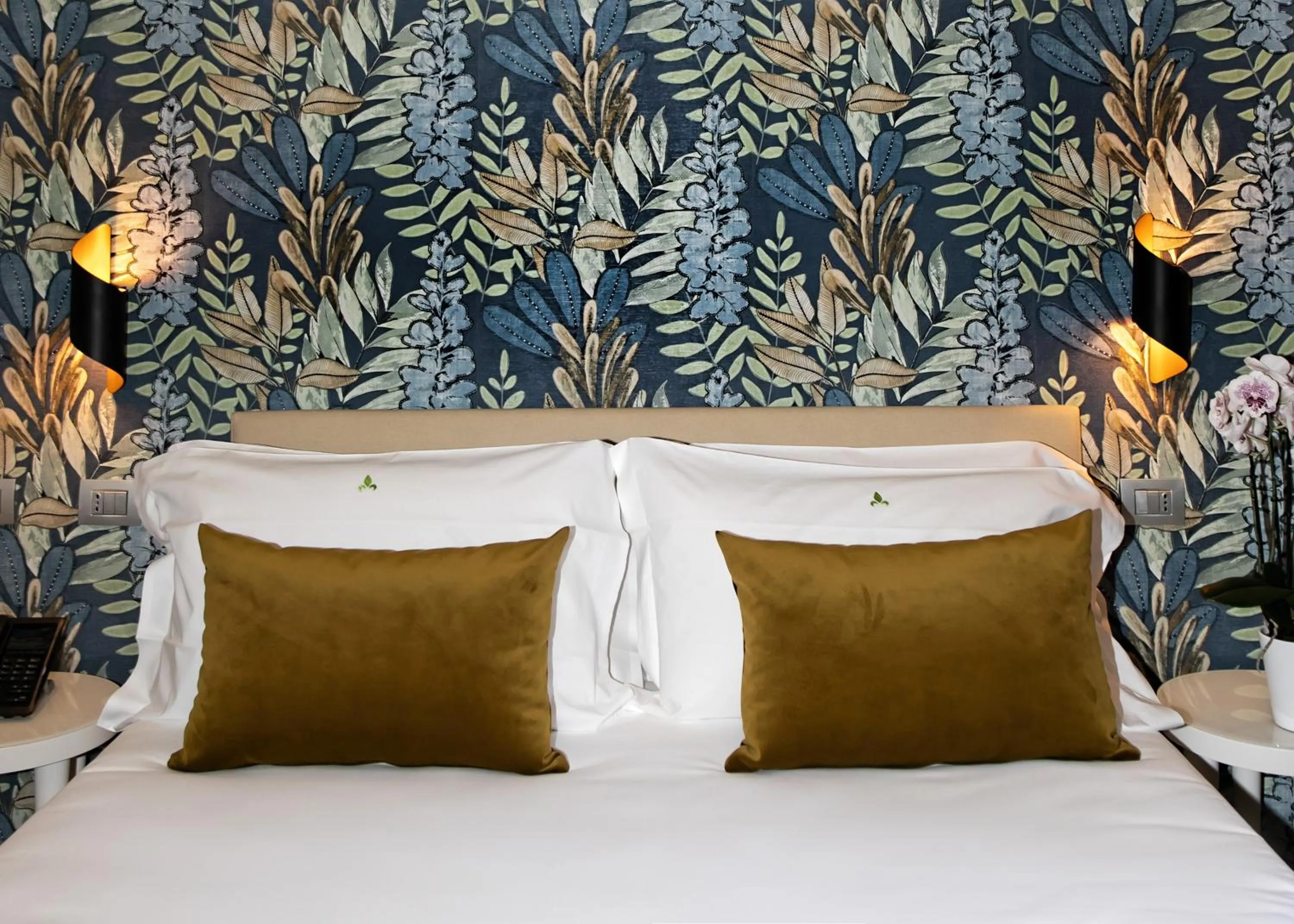 Bed in Hotel Caravita