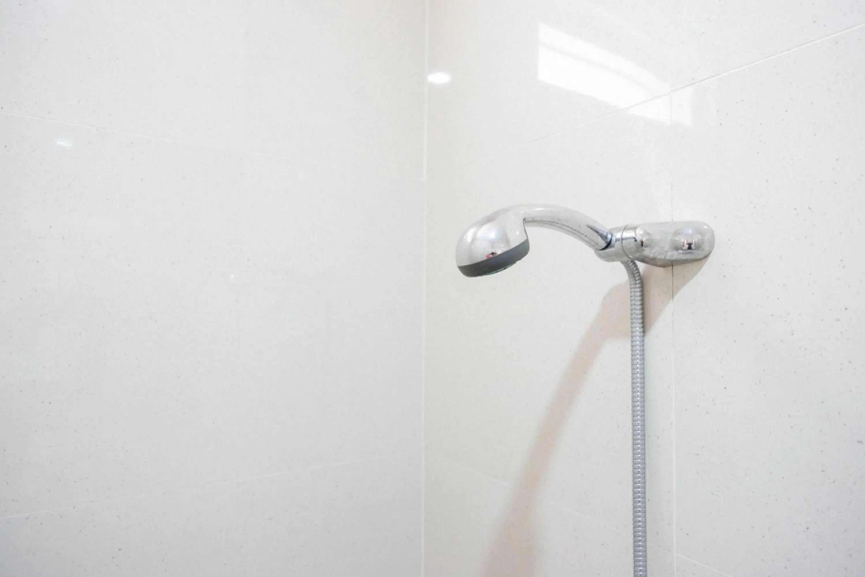 Bathroom in RedDoorz Plus Syariah near Stasiun Tegal 2