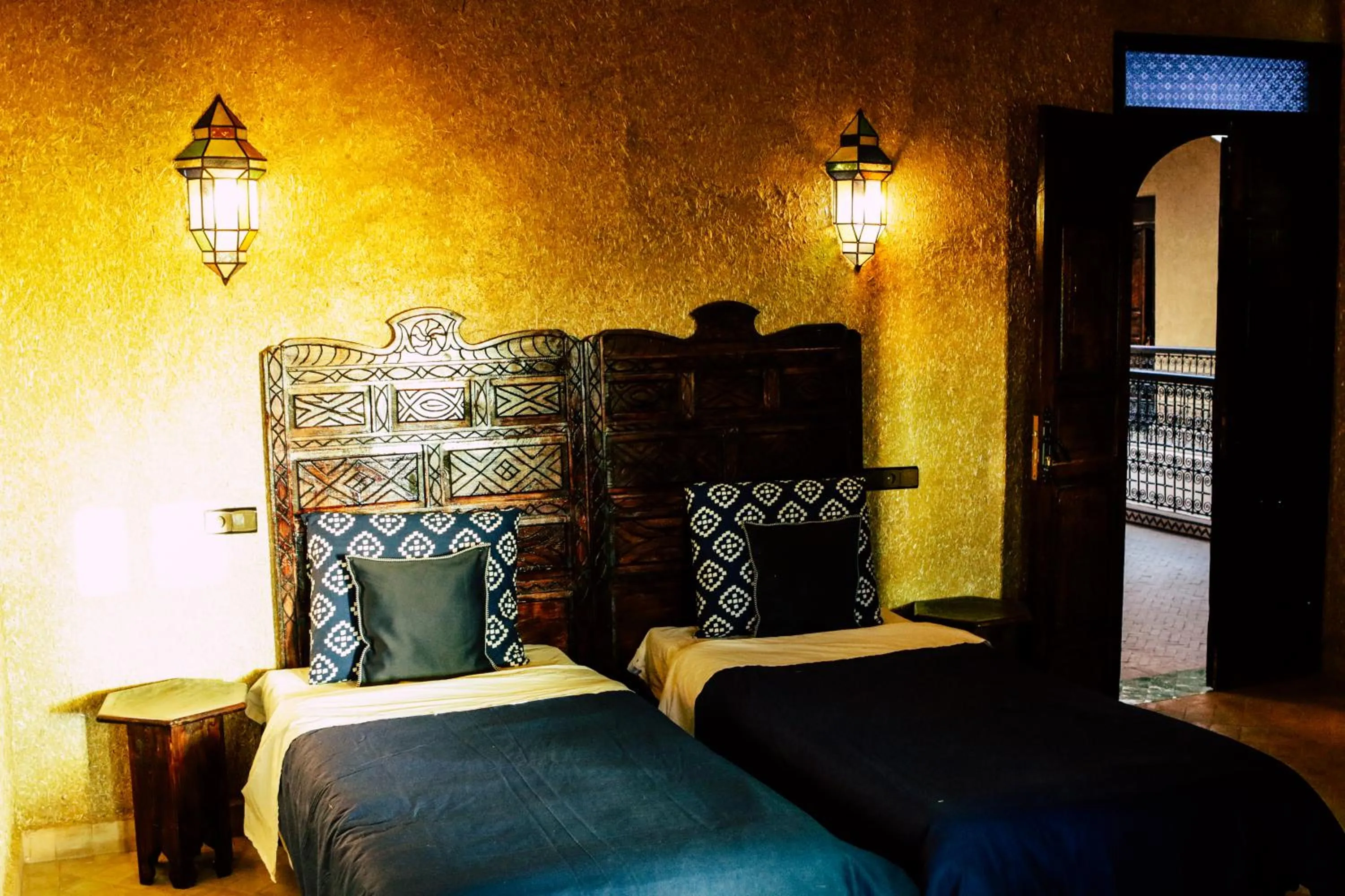 Bed in Riad Caravasar