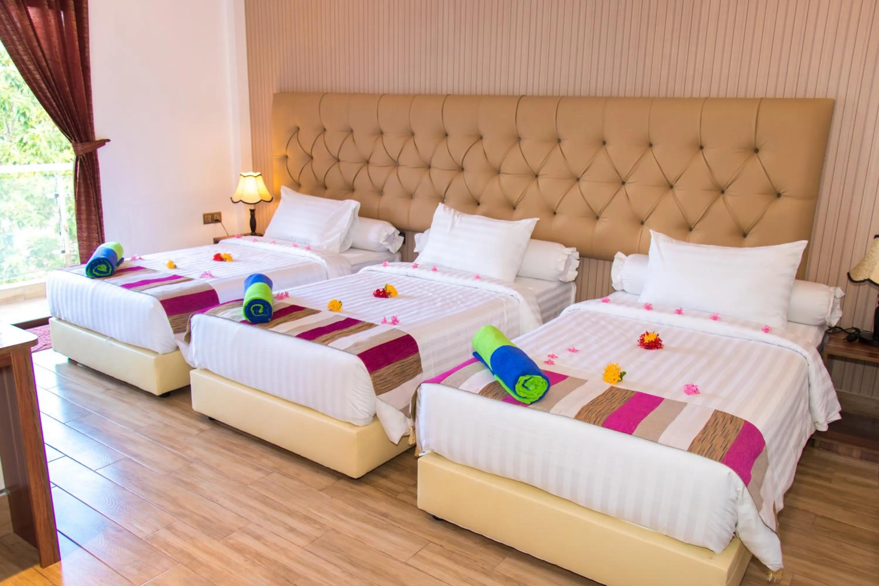 Bed in Rosy Villa Hotel