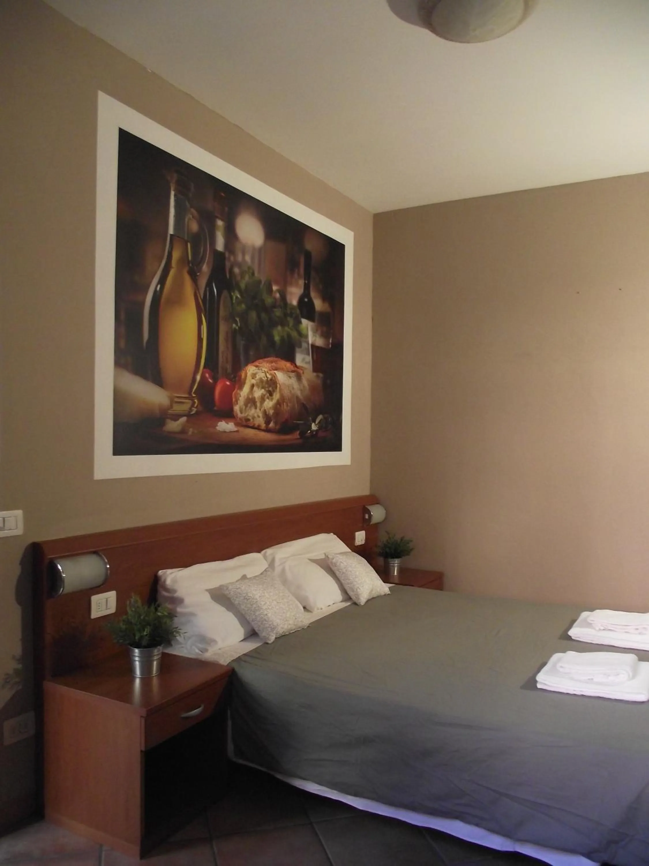 Bedroom in La Corte Albergo