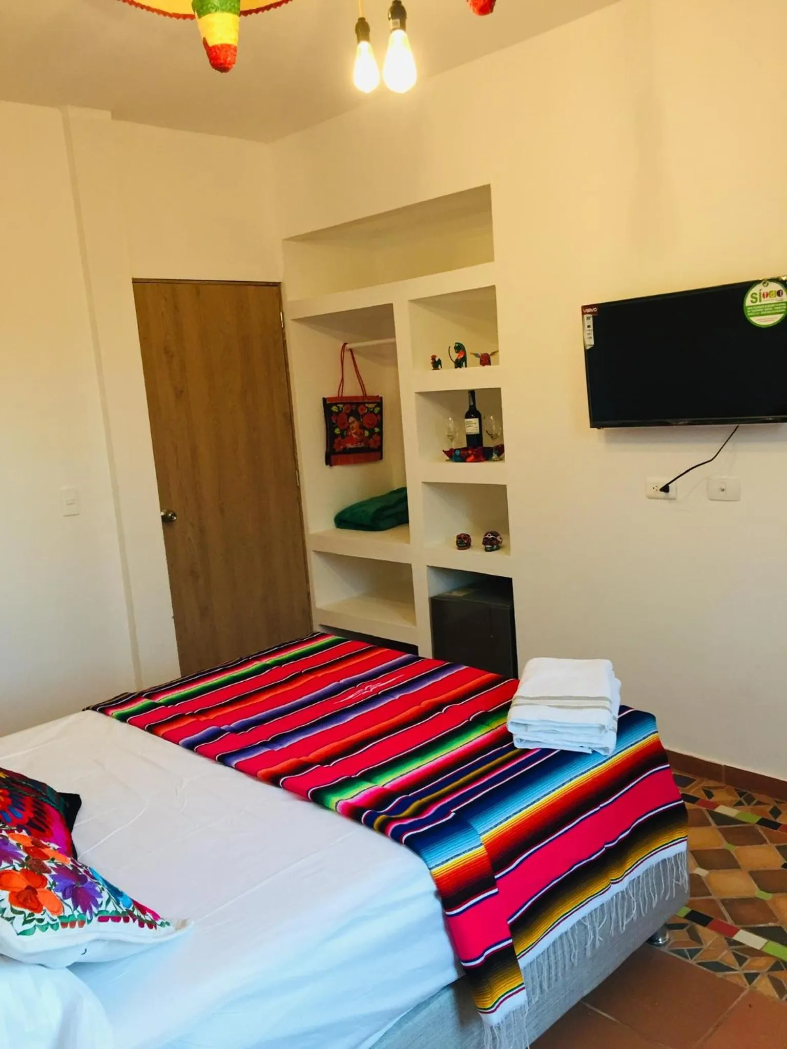 Photo of the whole room, Bed in Ritacuba House Boutique