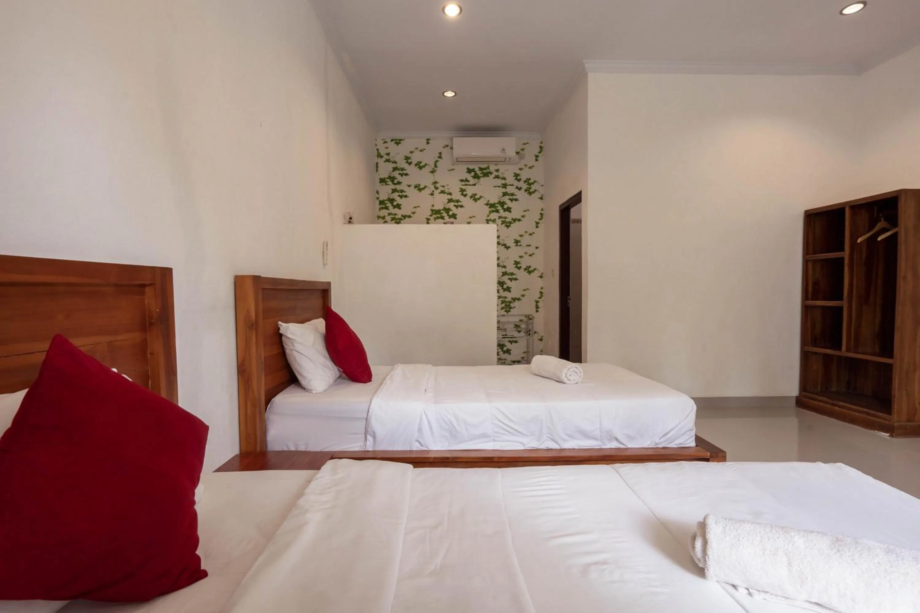 Bed in Omah Nusa Guesthouse RedPartner
