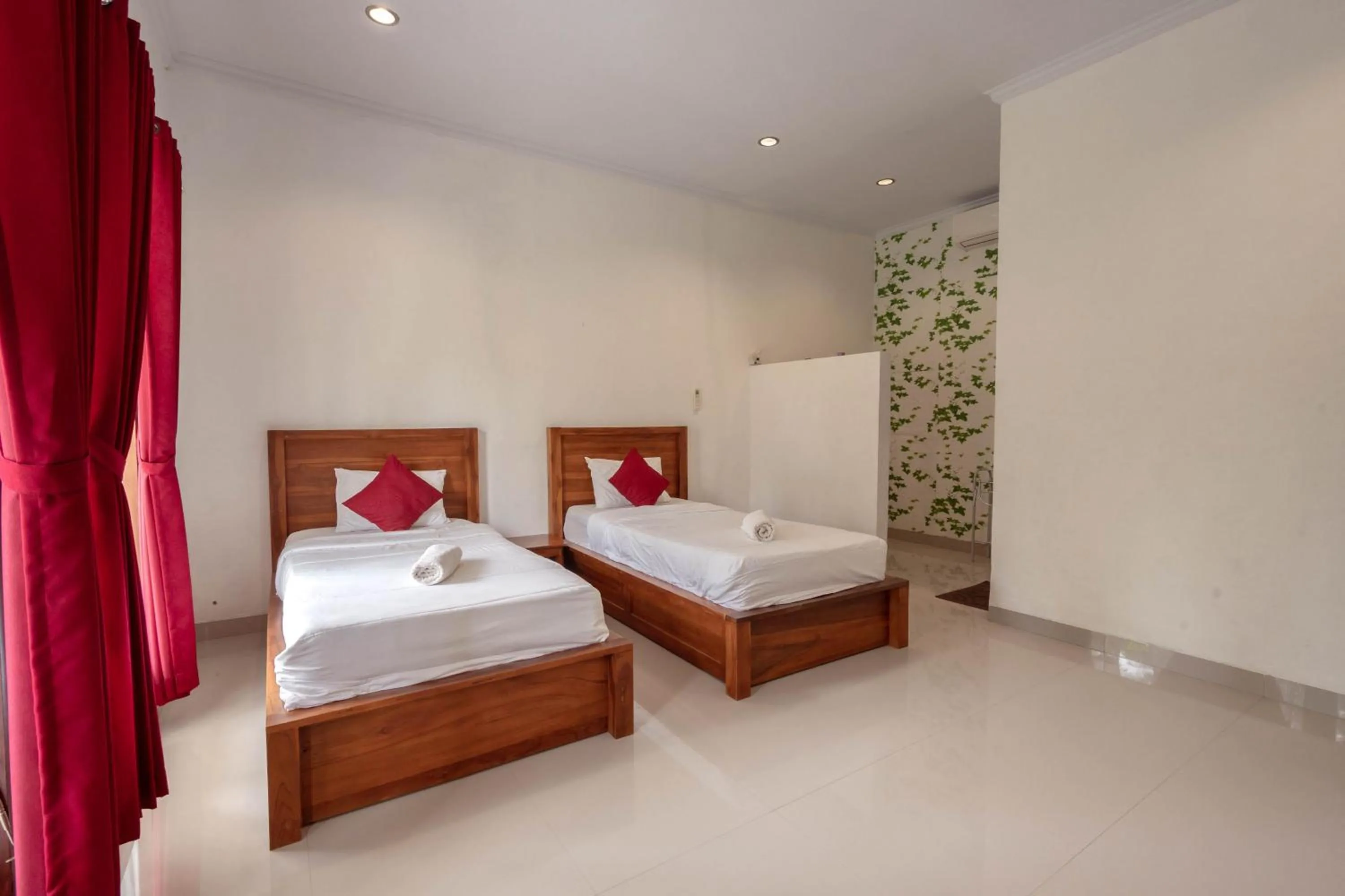 Bed in Omah Nusa Guesthouse RedPartner