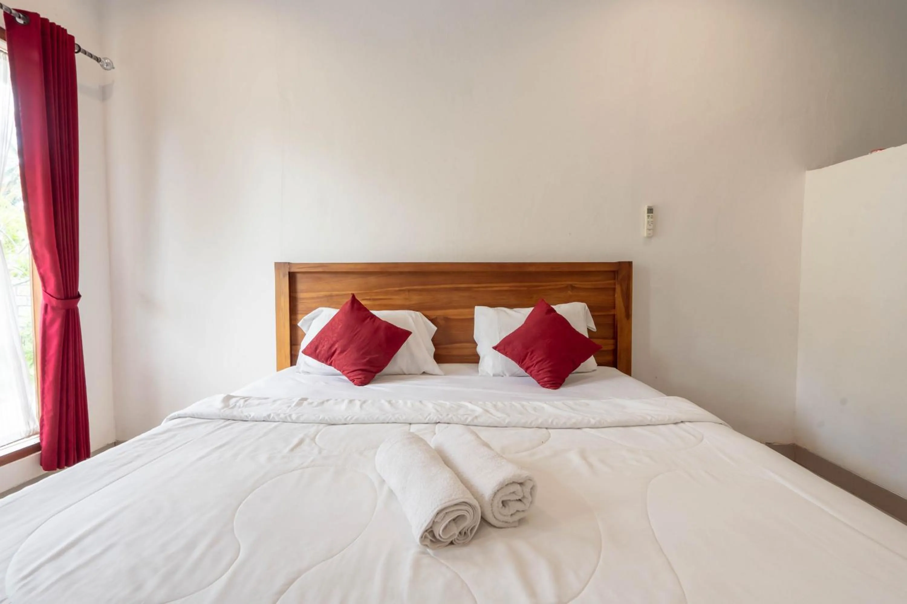 Bed in Omah Nusa Guesthouse RedPartner