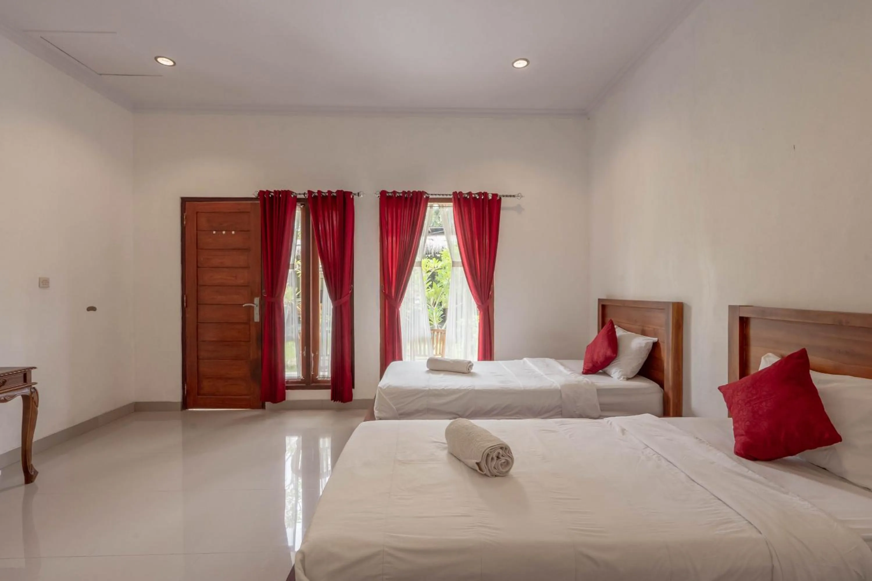 Bed in Omah Nusa Guesthouse RedPartner