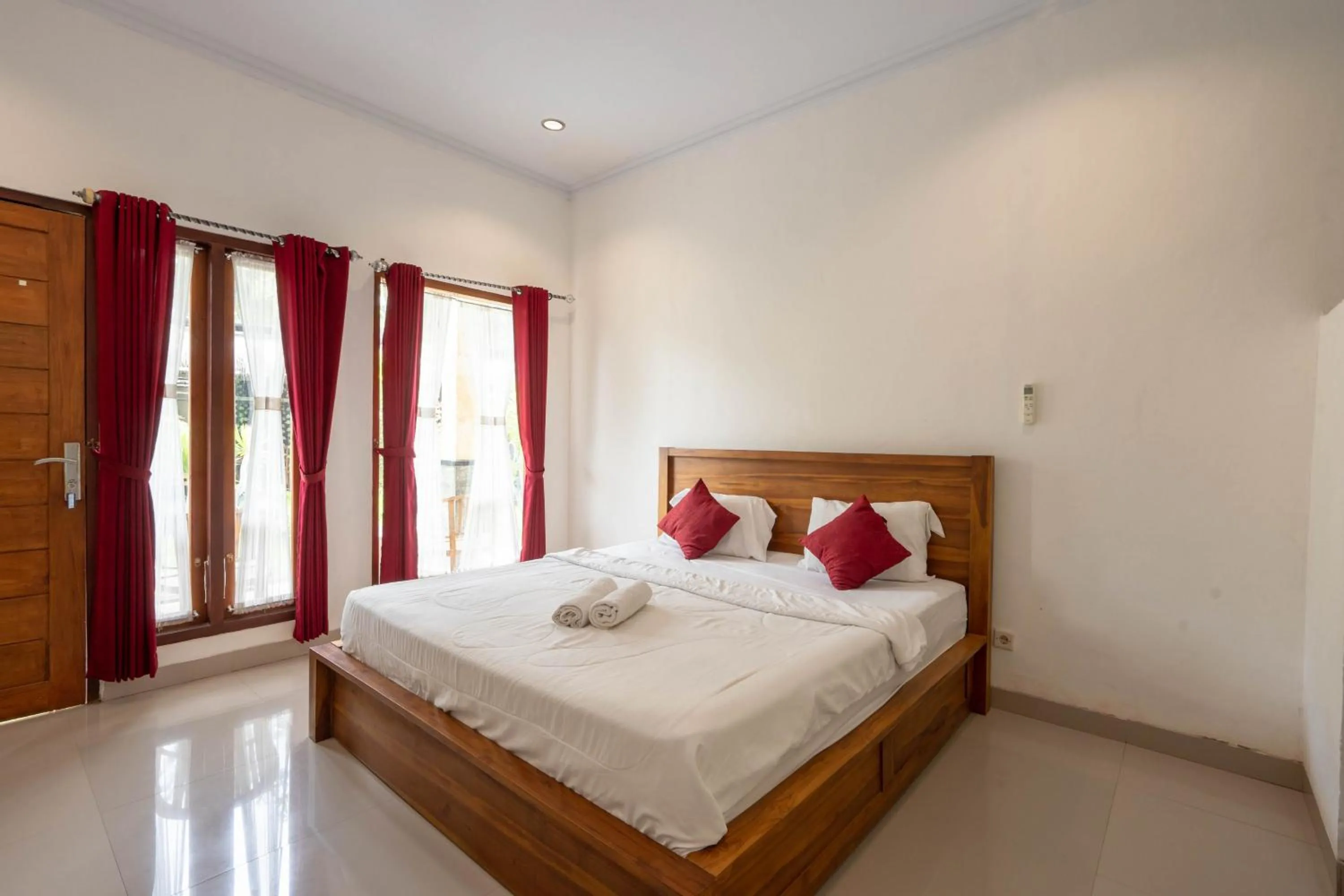 Bed in Omah Nusa Guesthouse RedPartner