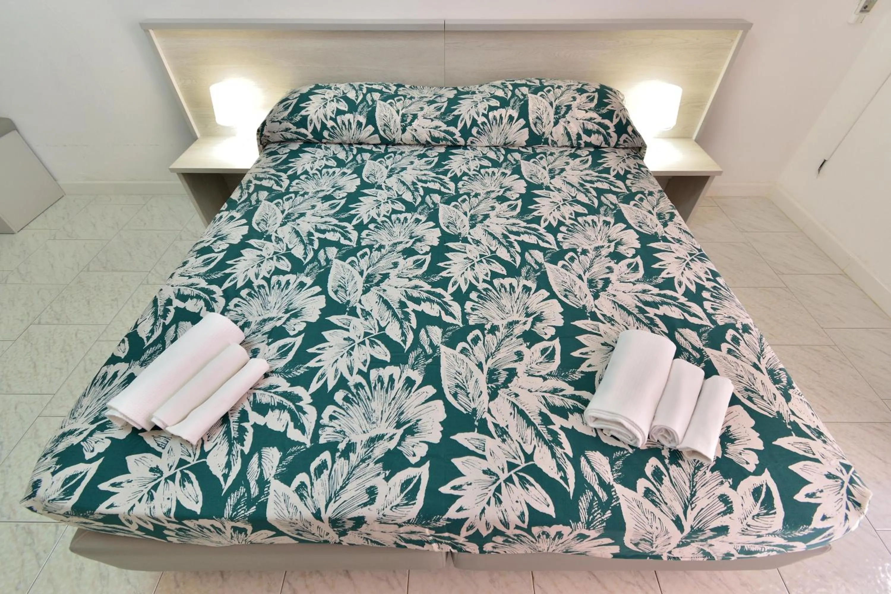 Bed in Eden Park Hotel