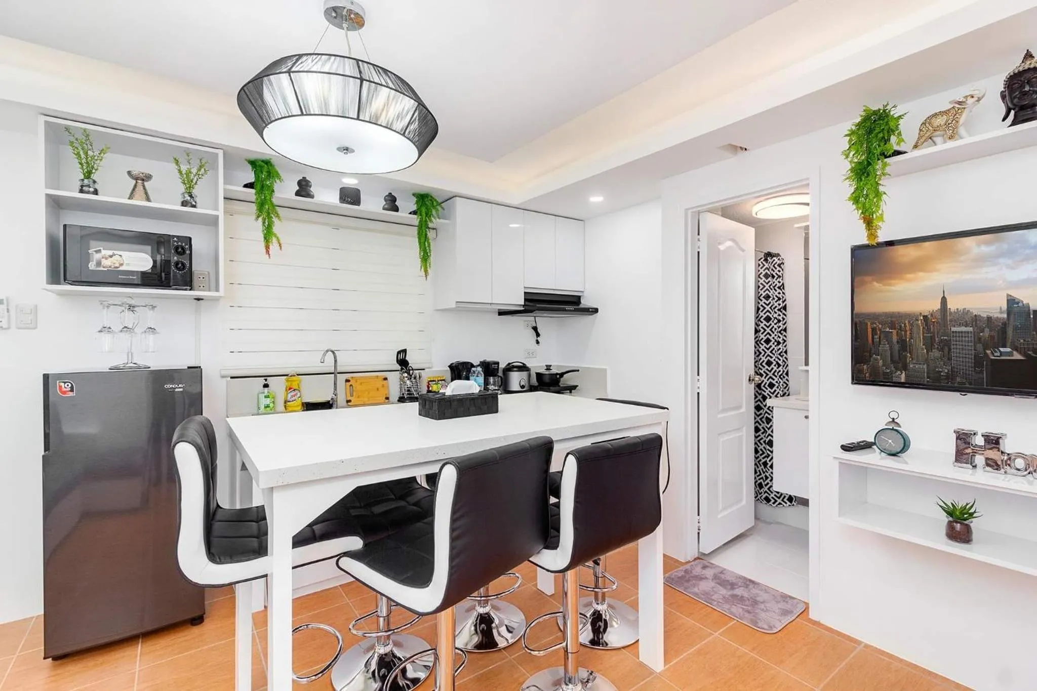 Dining area in Evania by J&J Homes 2BR Unit At One Oasis Cebu