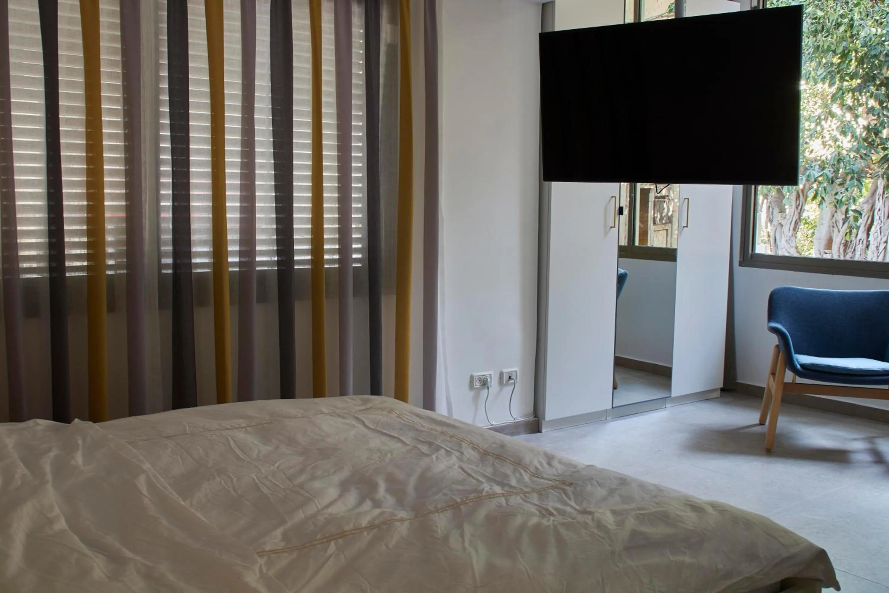 Bed in Roza Apartment