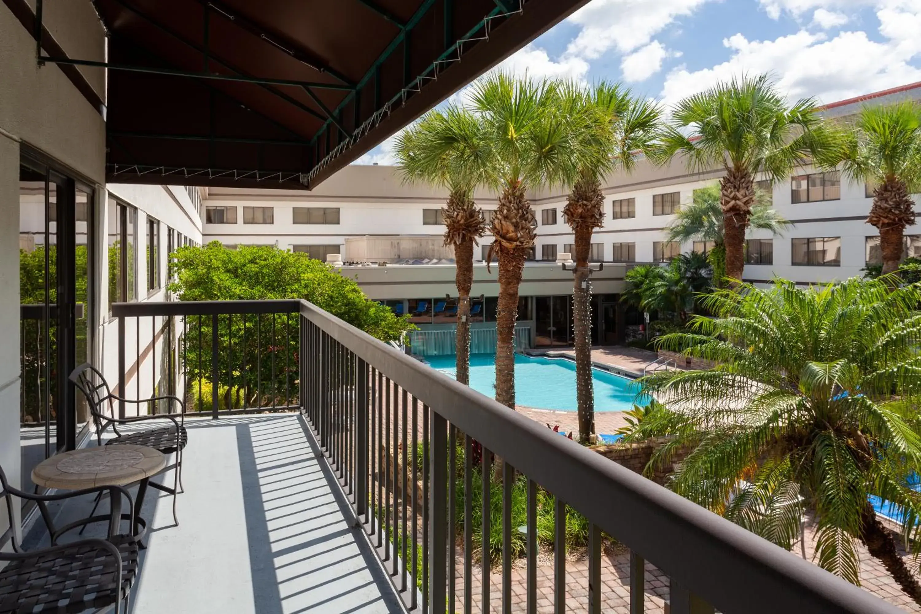 One-Bedroom Suite with Balcony and Pool View in Sheraton Suites Orlando Airport Hotel One-Bedroom Suite with Balcony and Pool View in Sheraton Suites Orlando Airport Hotel
