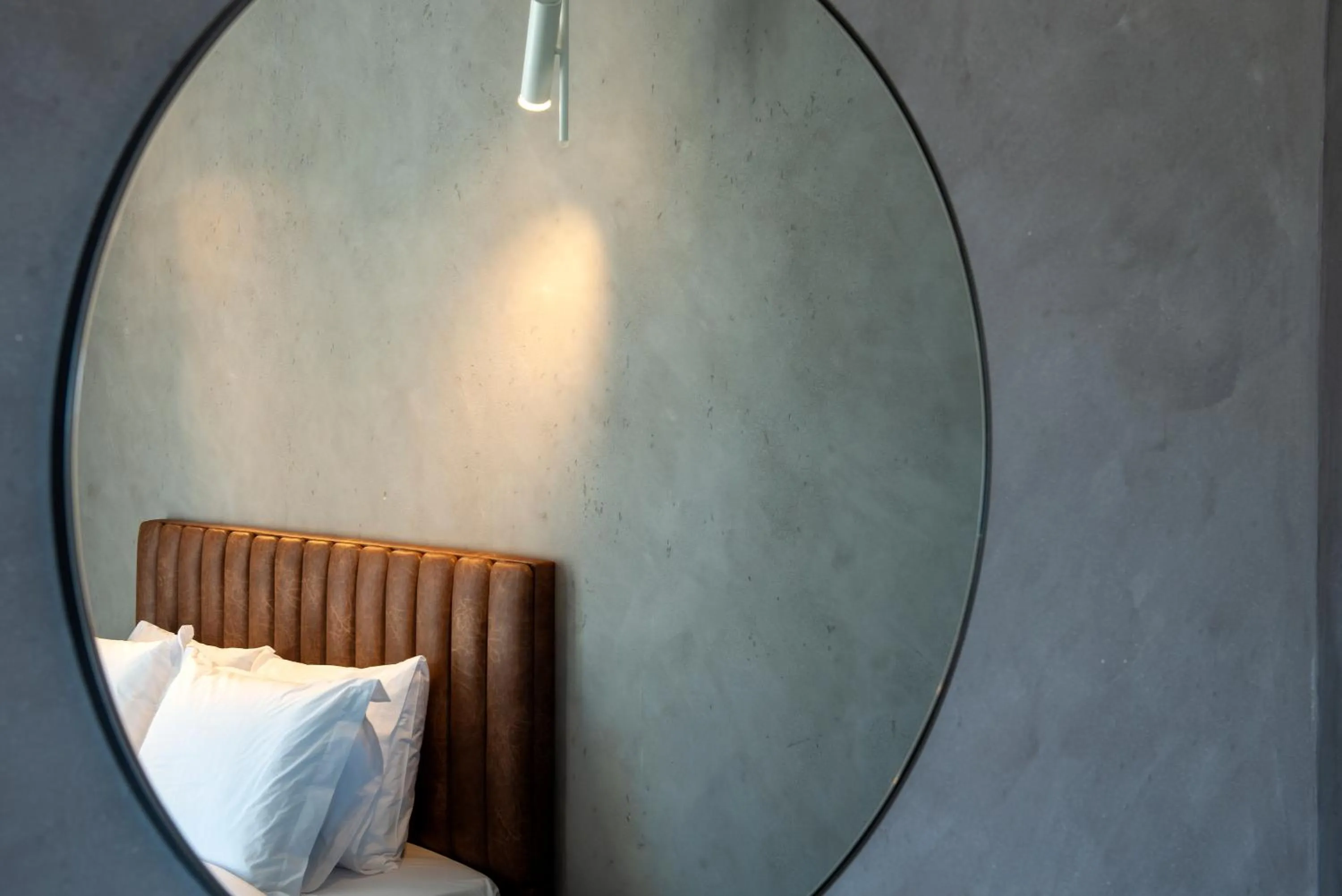 Bed in ZUR Studios and Suites