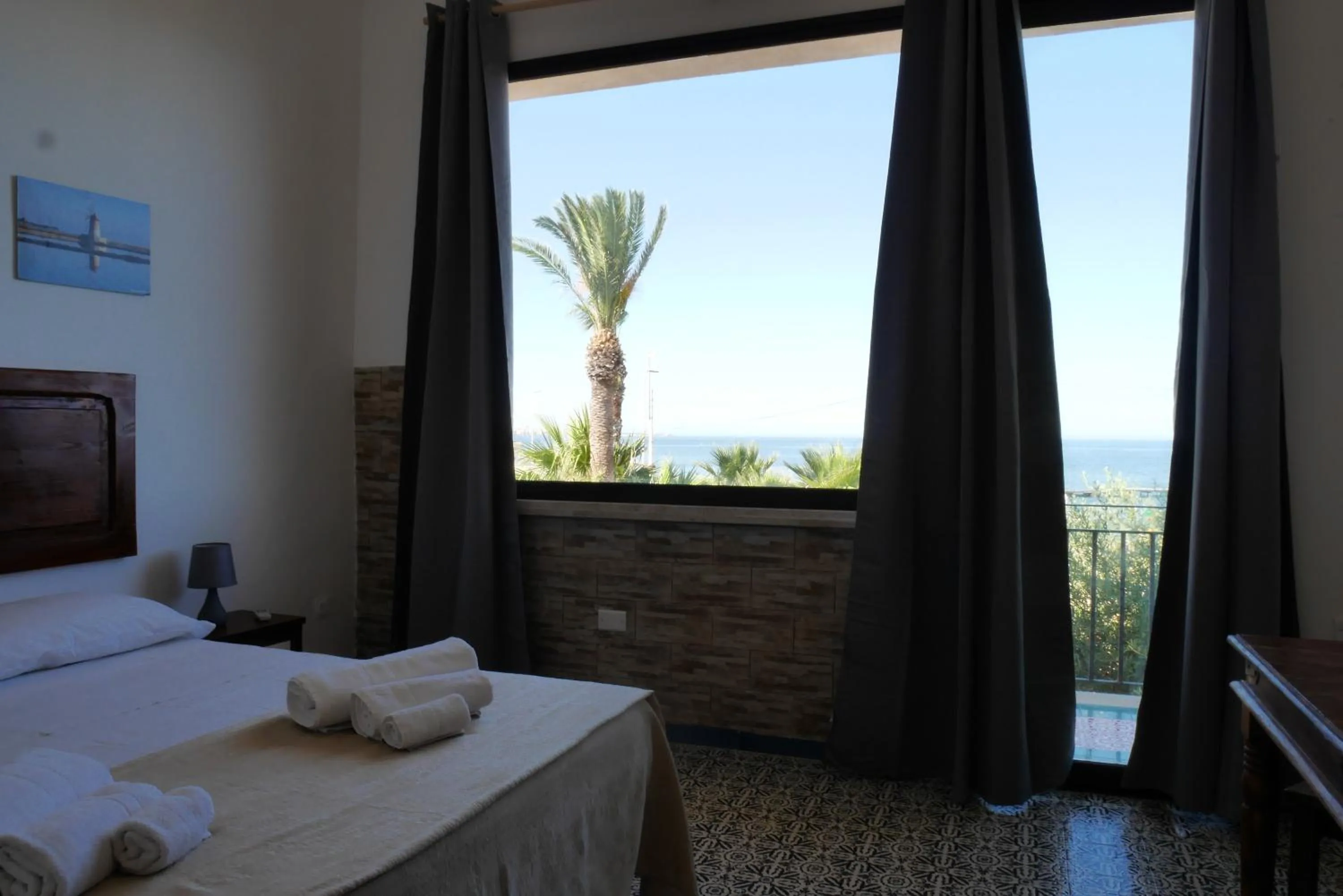 View (from property/room), Bed in B&B Al Vecchio Pontile B&B MARSALA