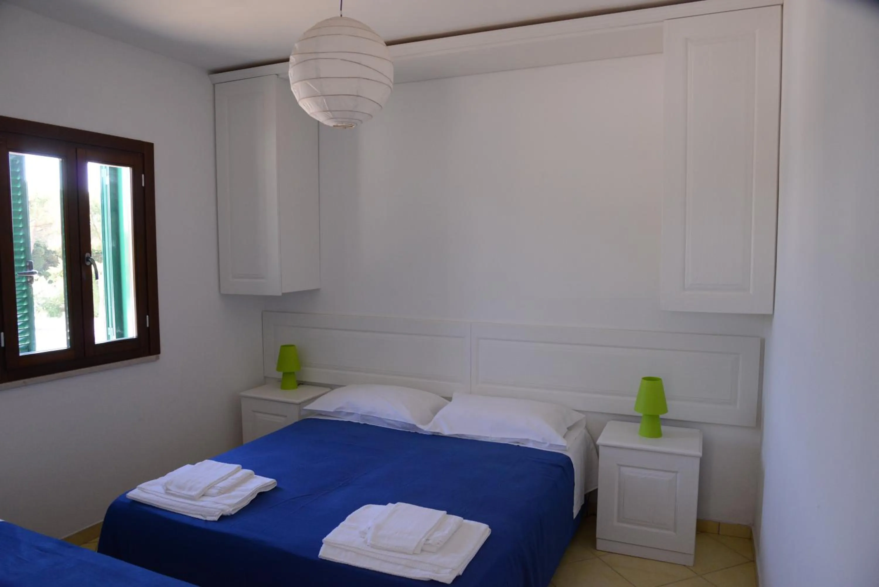 Bed in Chiusurelle Village Resort