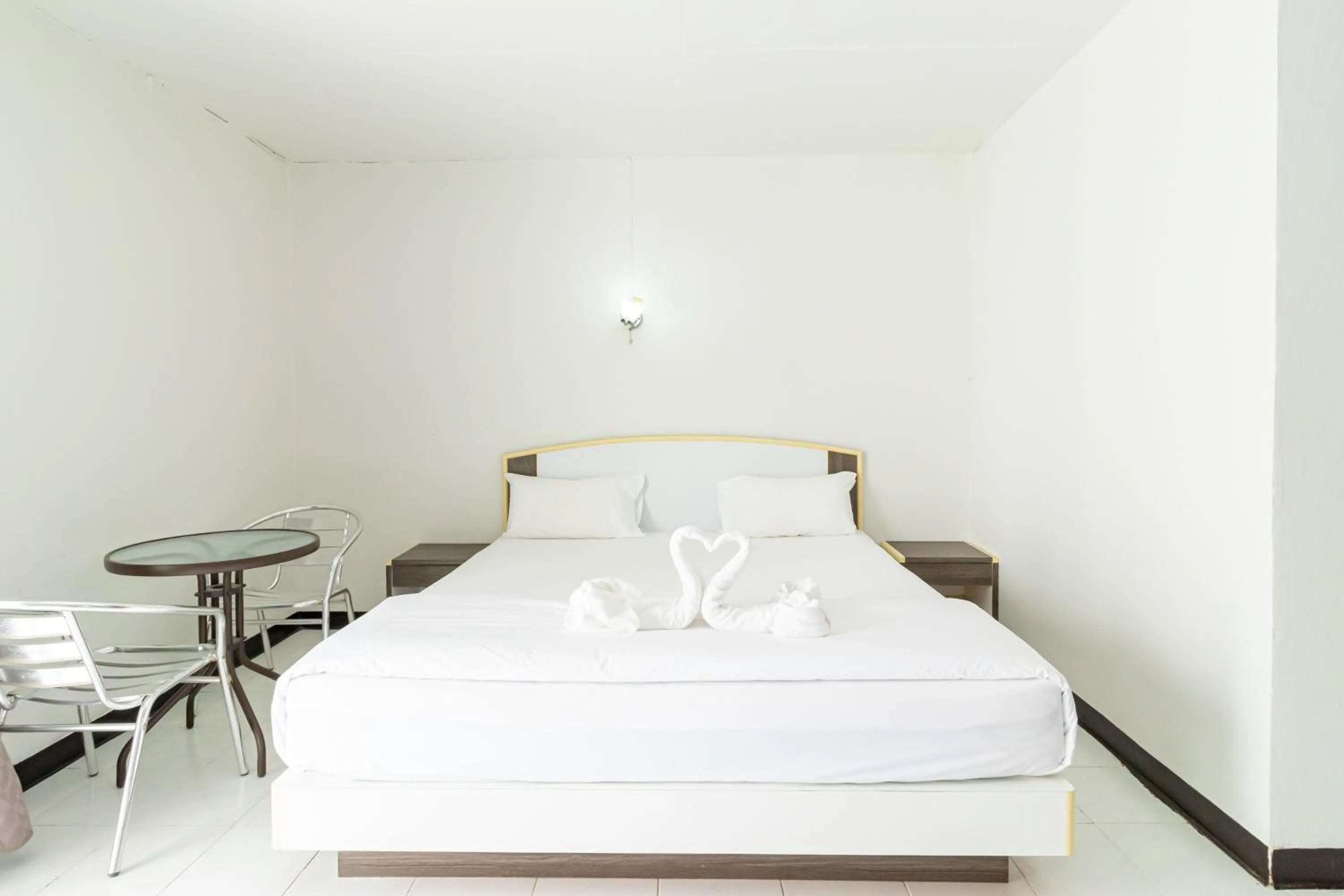 Bed in Boonchai Mansion