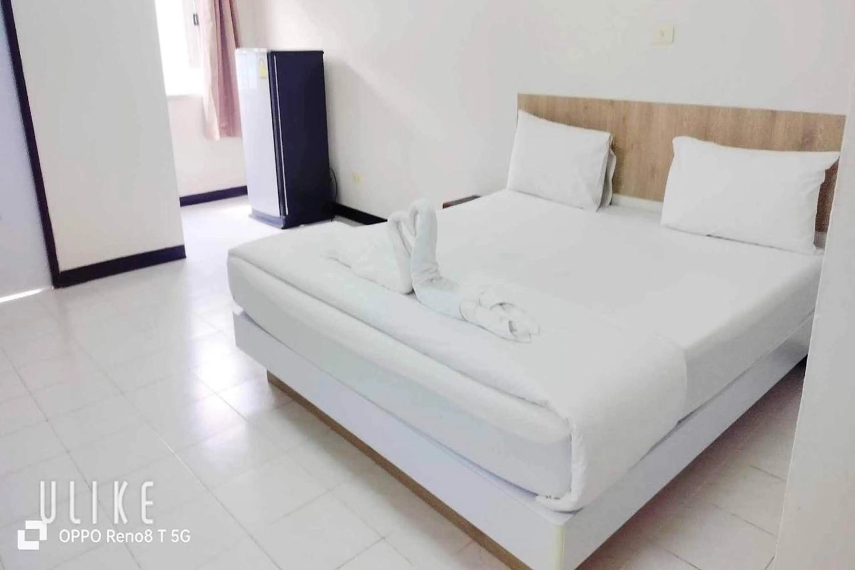 Bed in Boonchai Mansion