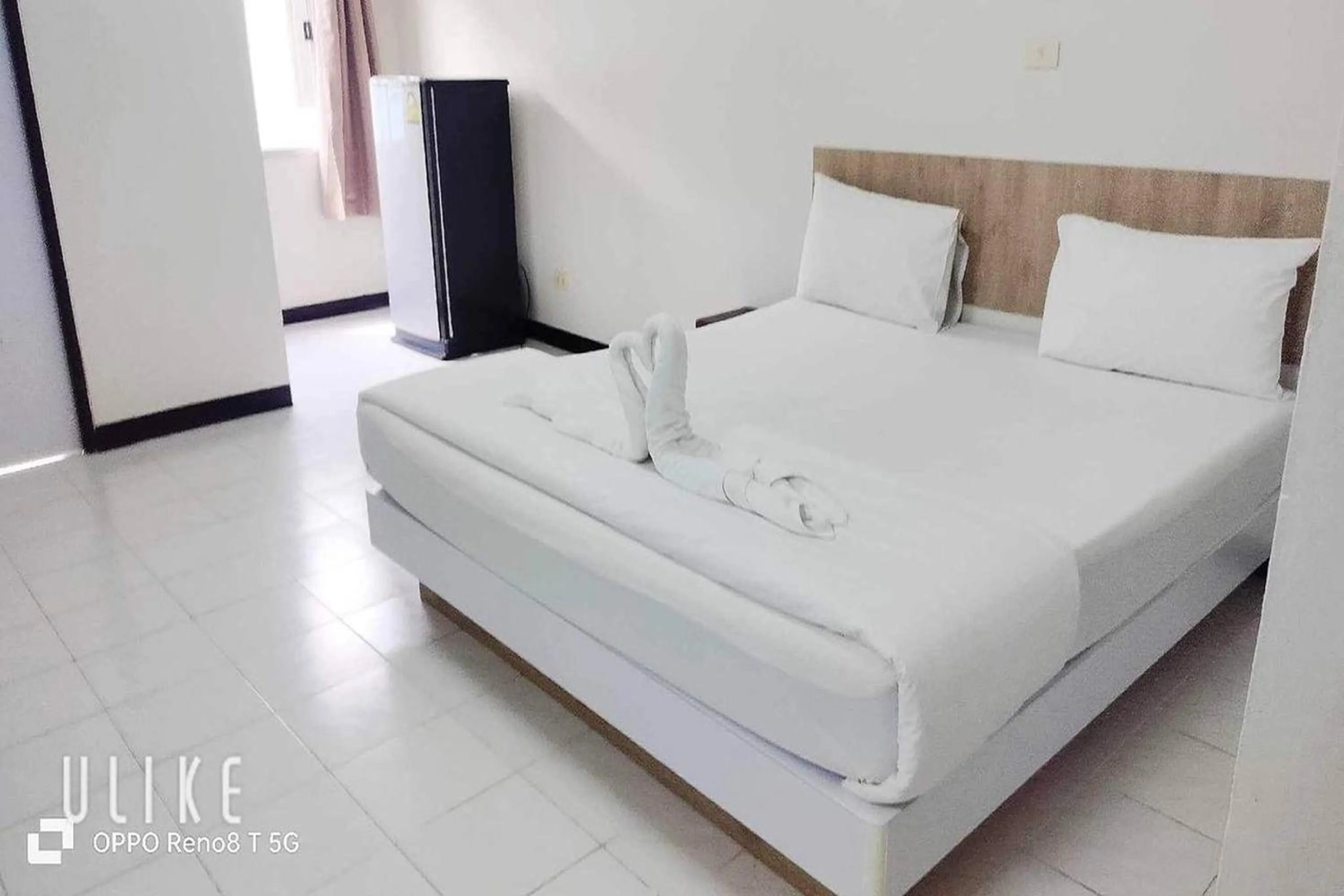 Bed in Boonchai Mansion