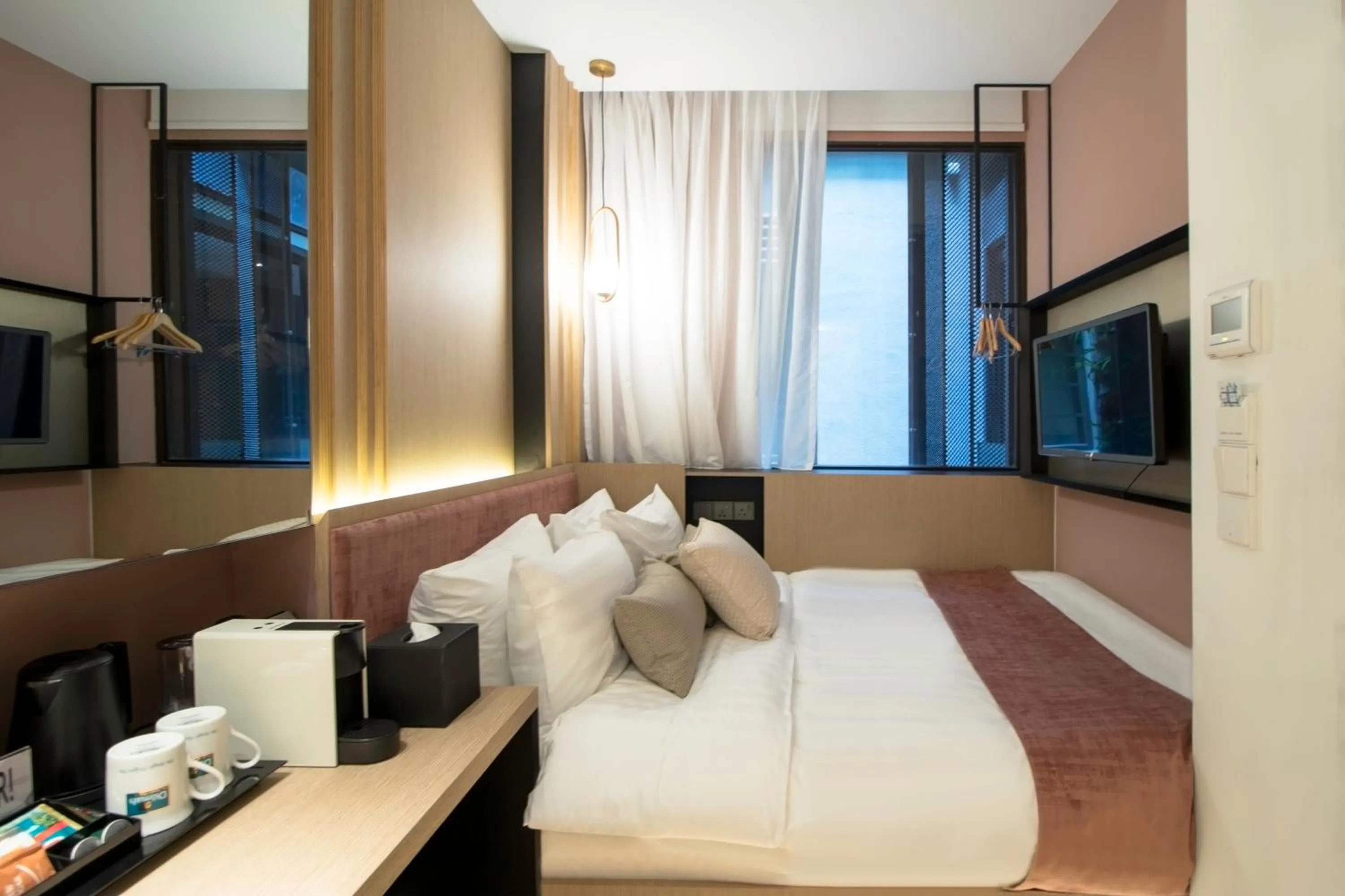 Bed in Hotel NuVe Elements