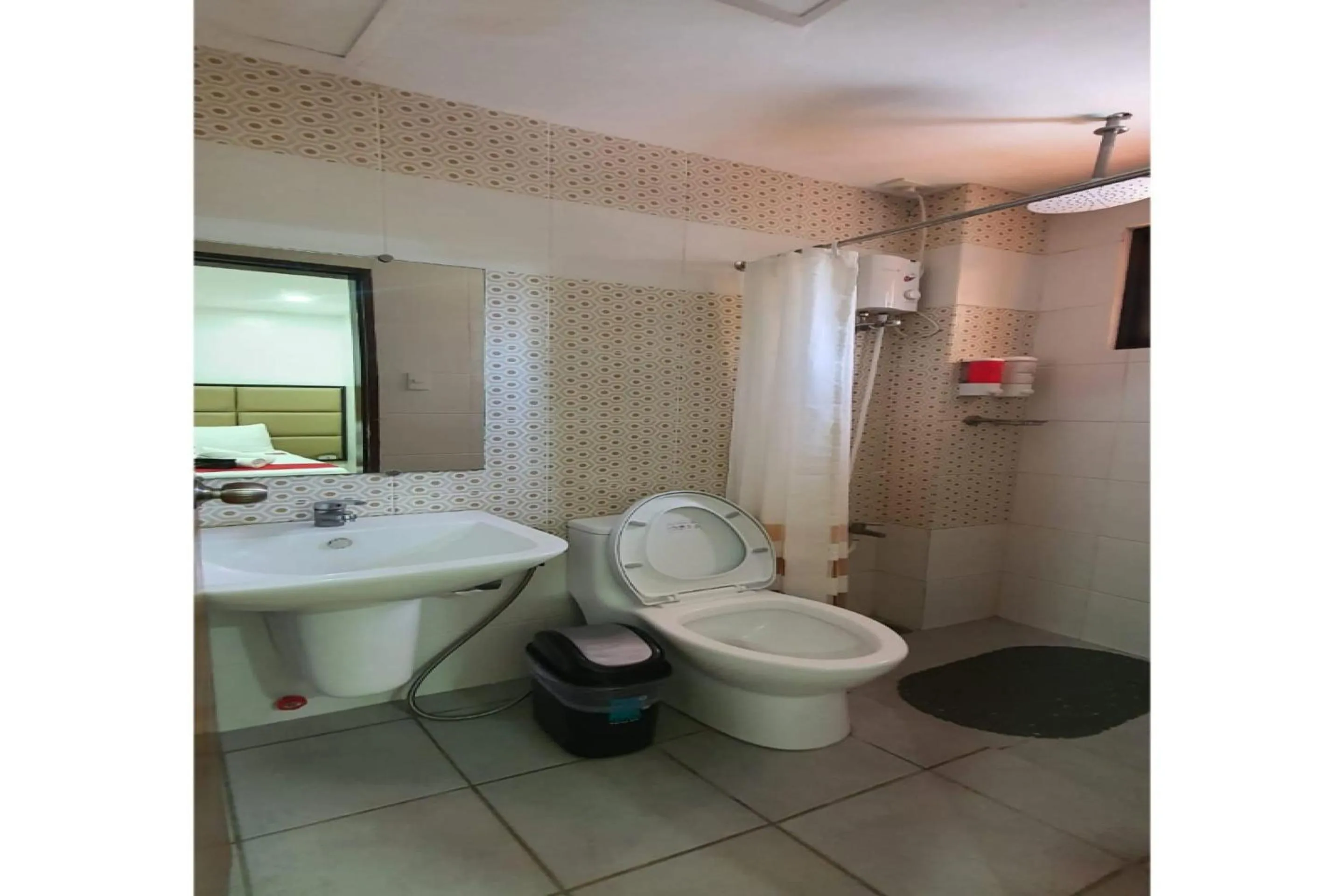 Bathroom in OYO 869 Jnv Dream Hotel