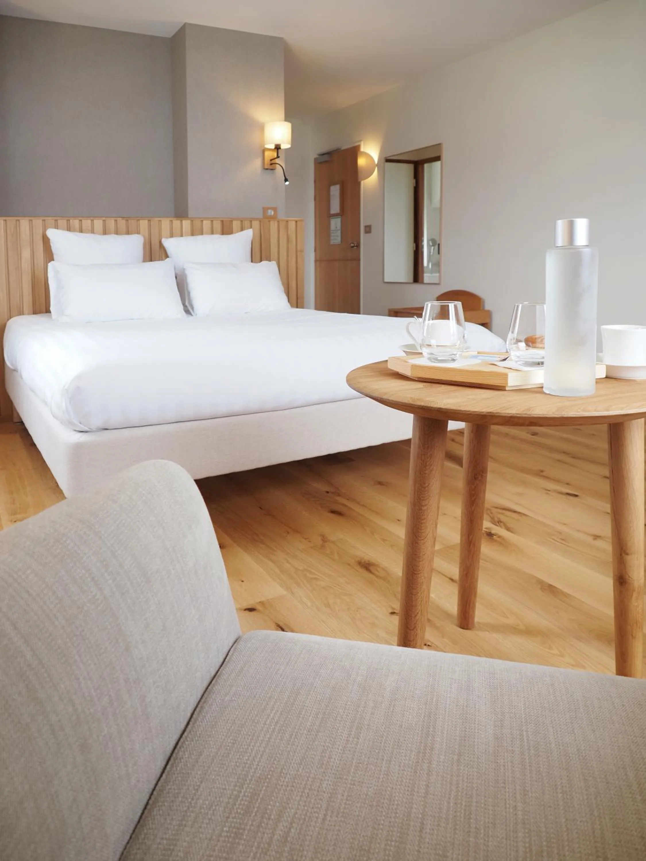 Bed in Logis Hôtel de Carantec