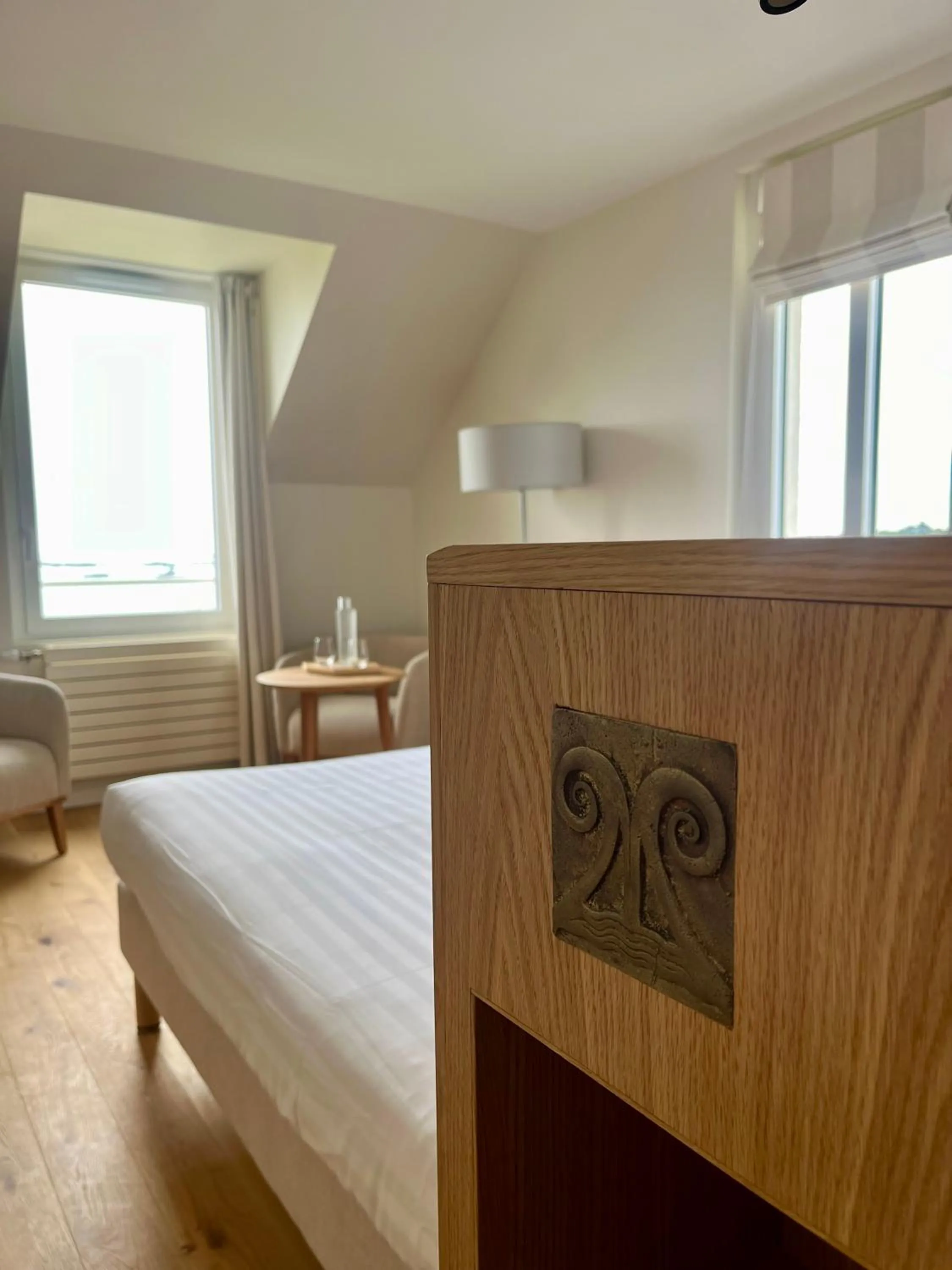 Bed in Logis Hôtel de Carantec