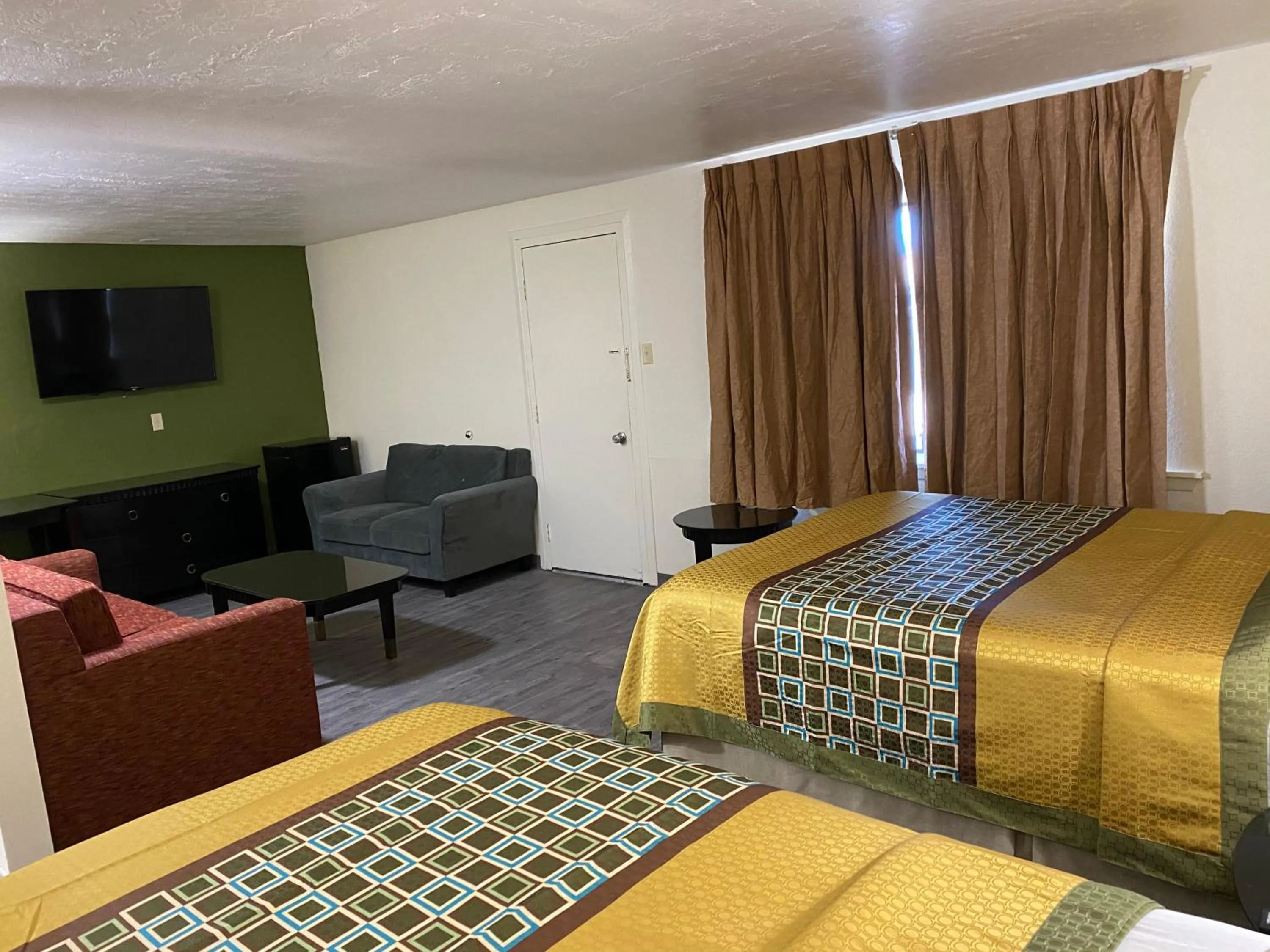 Bed in Palomino Motel