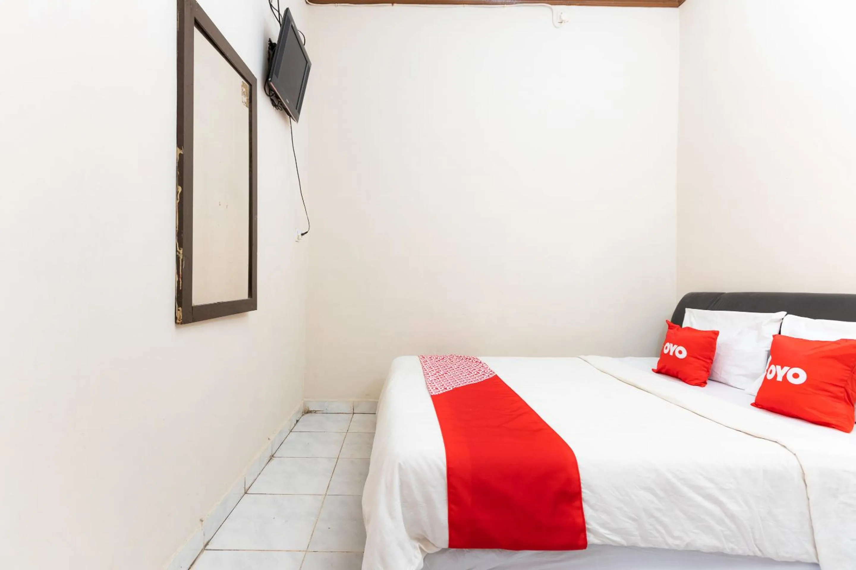 Bedroom in Hotel O Wisma Pelita Mas