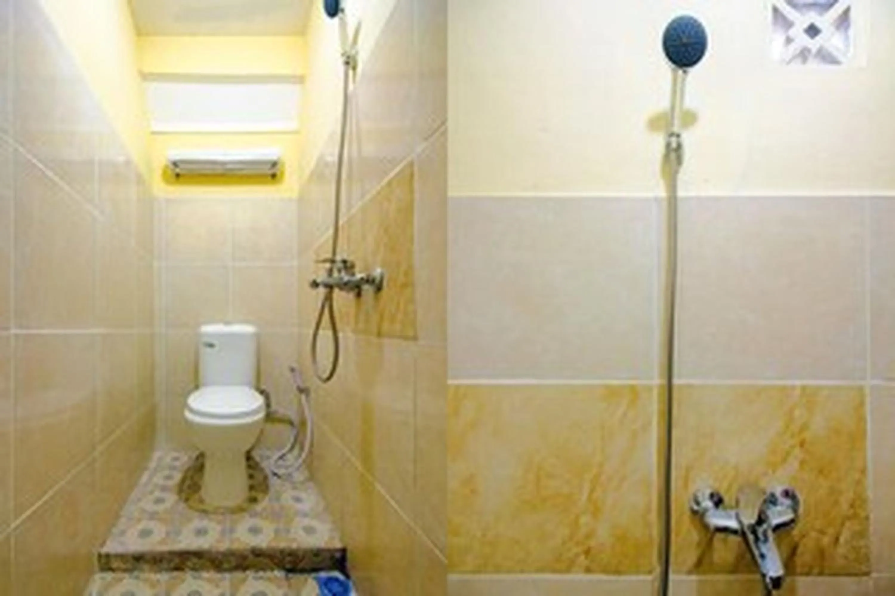 Bathroom in OYO Life 1643 Grand Monica