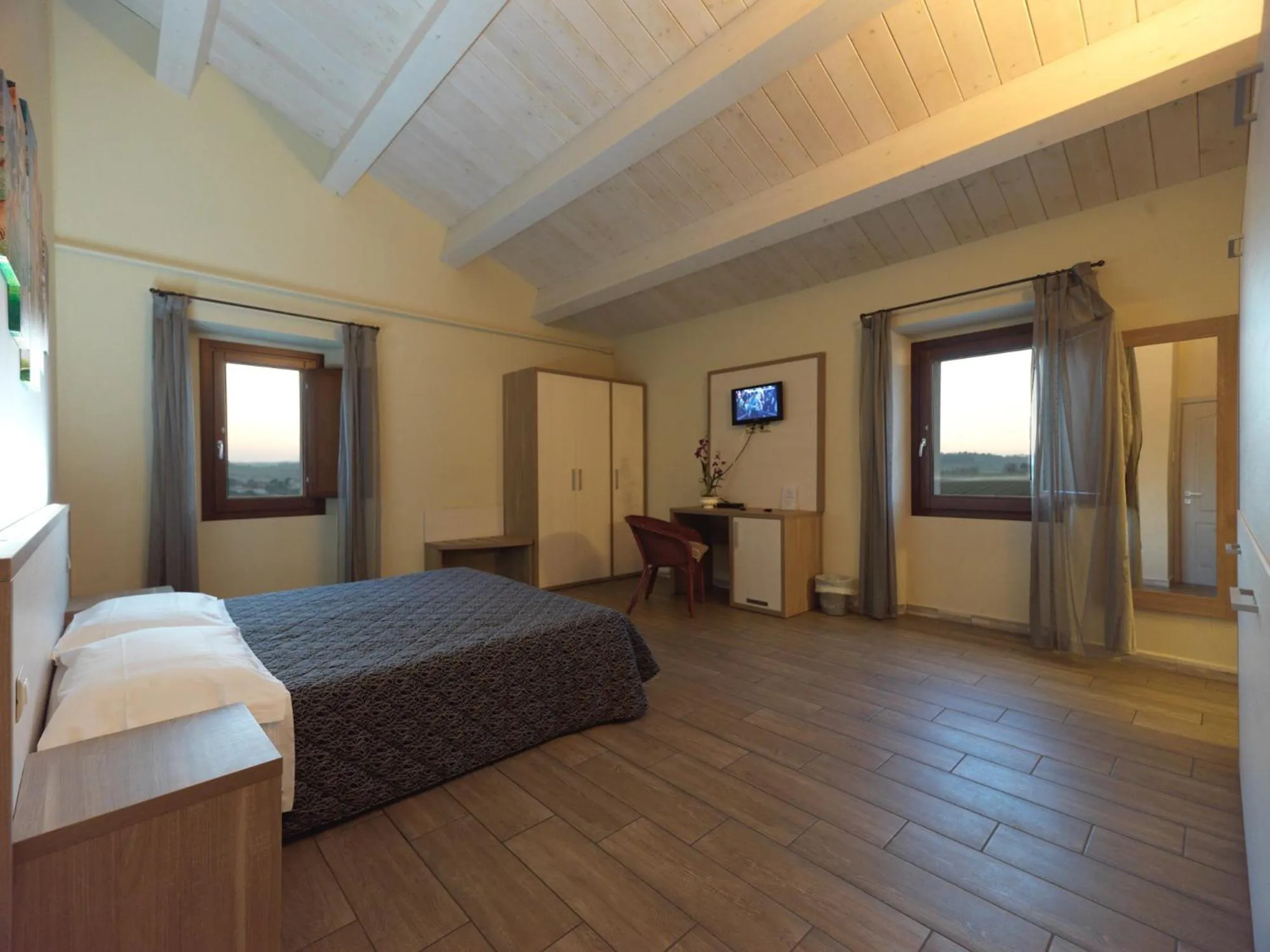 Bed in Hotel Ristorante Cantina Langelina