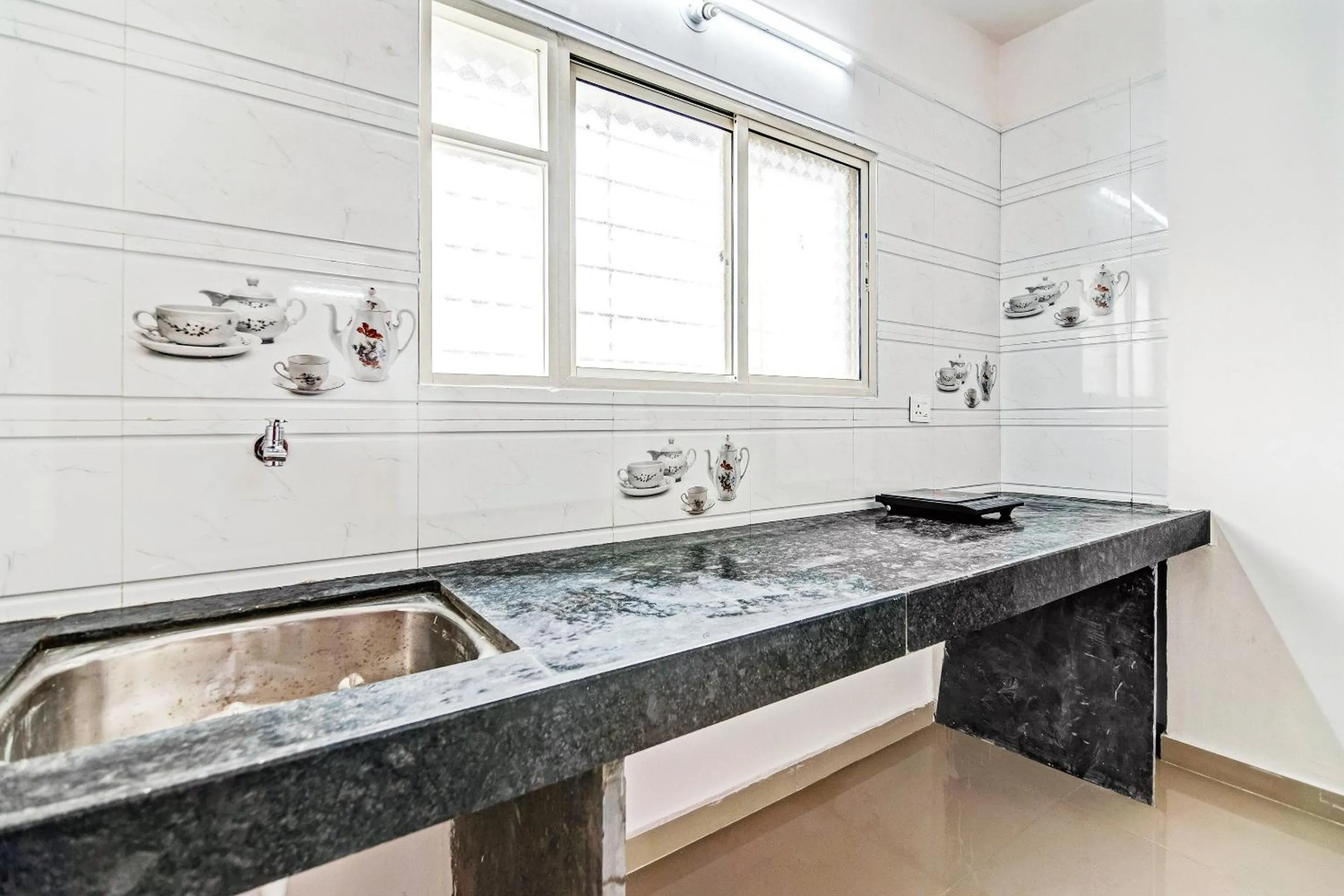 Kitchen or kitchenette in Super Hotel O Home Elegant RK Fursungi