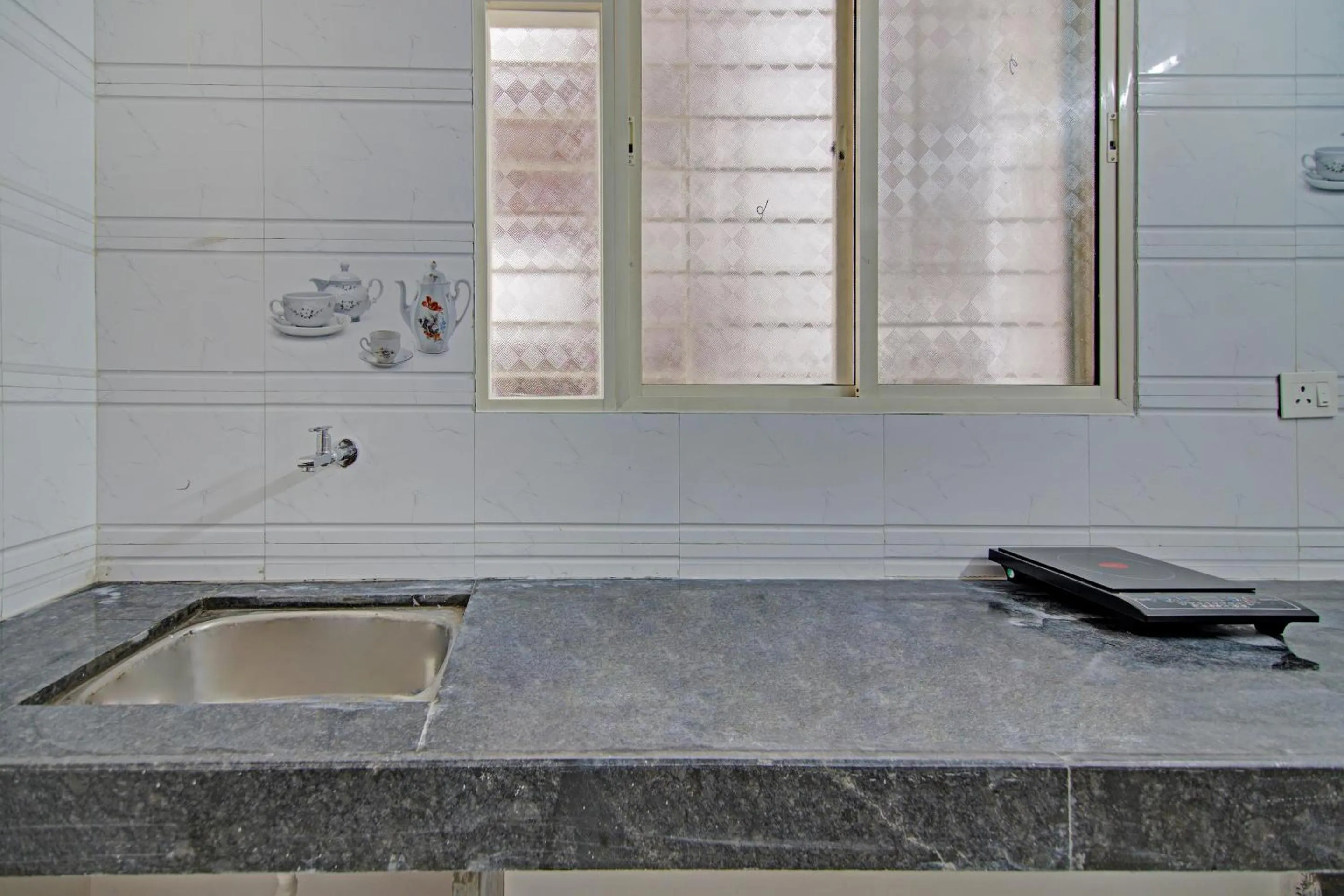 Kitchen or kitchenette in Super Hotel O Home Elegant RK Fursungi