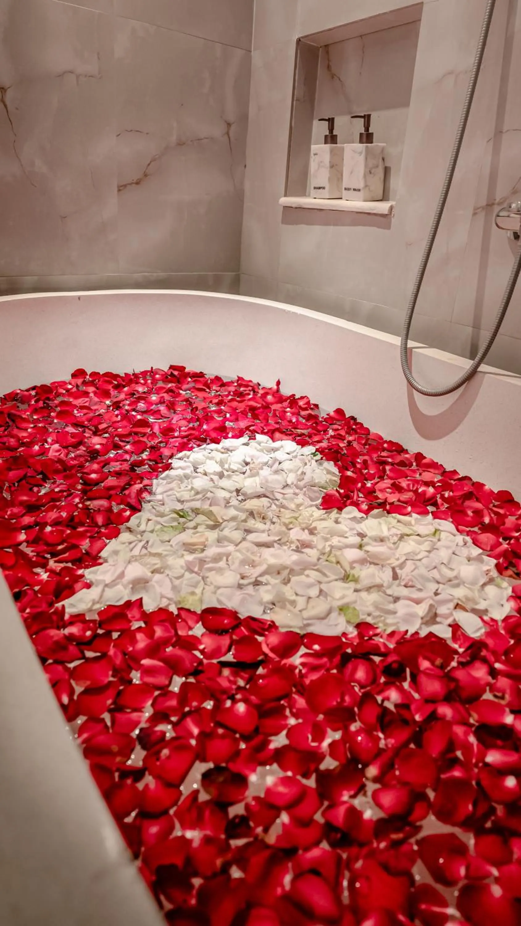 Bath in The Capital Hotel and Resort Seminyak