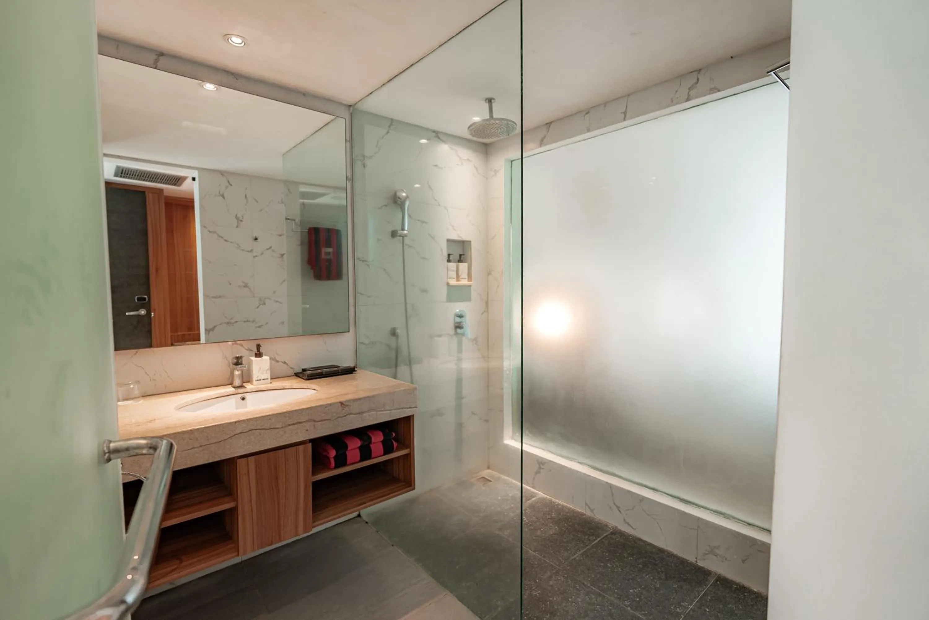 Shower in The Capital Hotel and Resort Seminyak