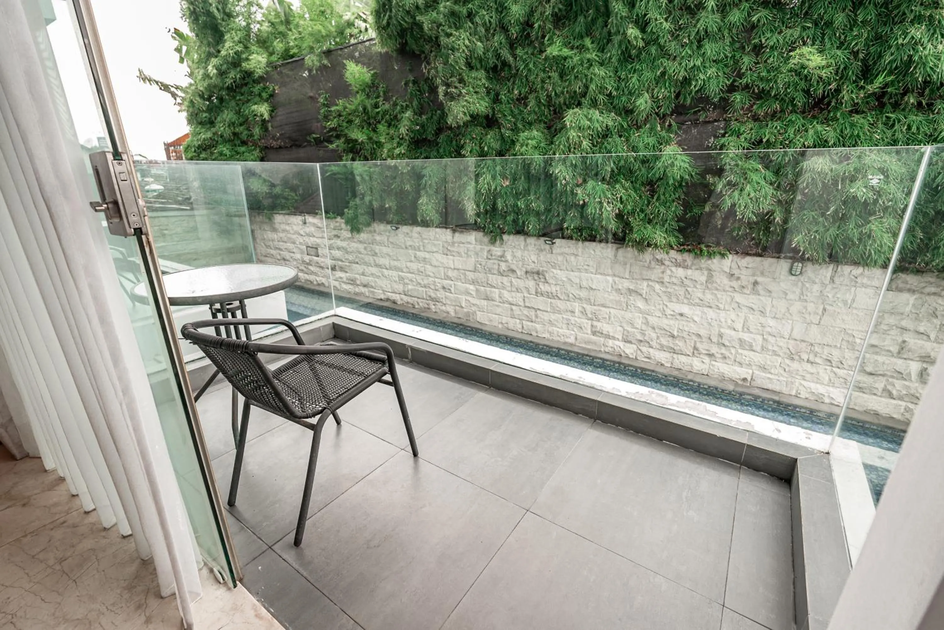 Balcony/Terrace in The Capital Hotel and Resort Seminyak