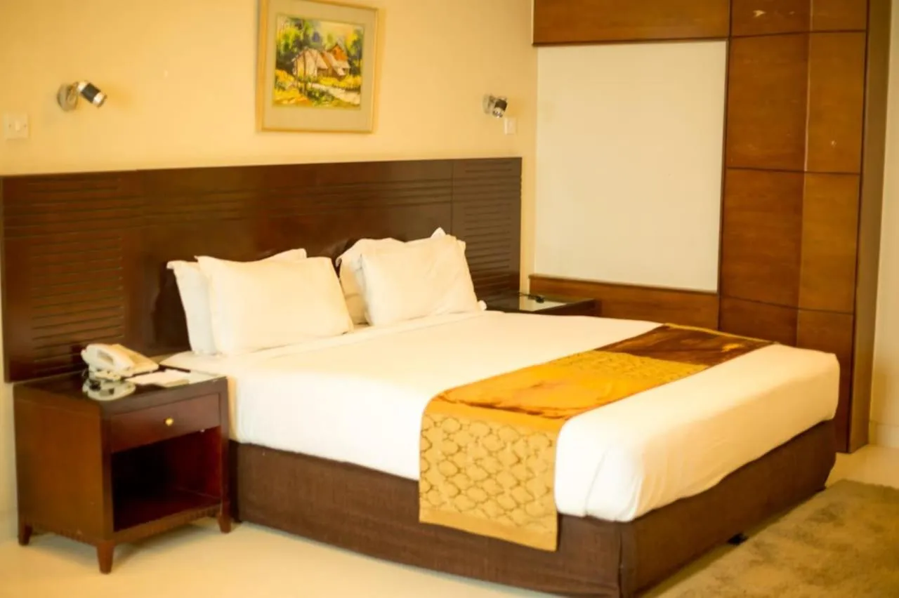 Bed in The Avenue Hotel & Suites