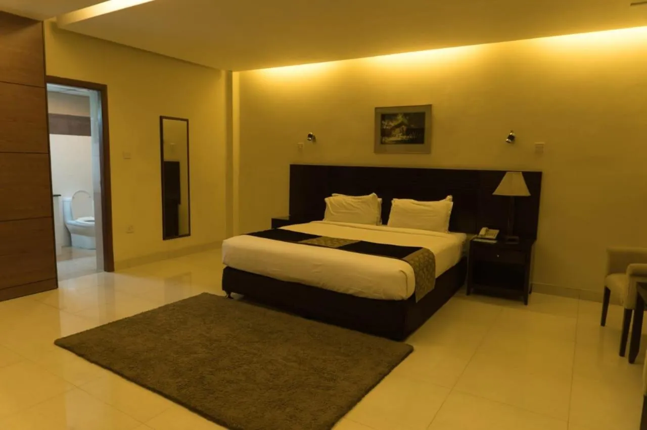 Bed in The Avenue Hotel & Suites