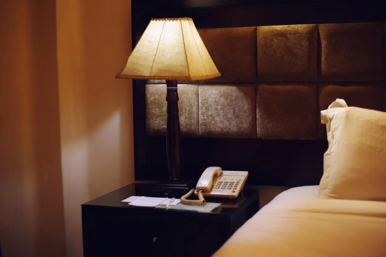 Bed in The Avenue Hotel & Suites