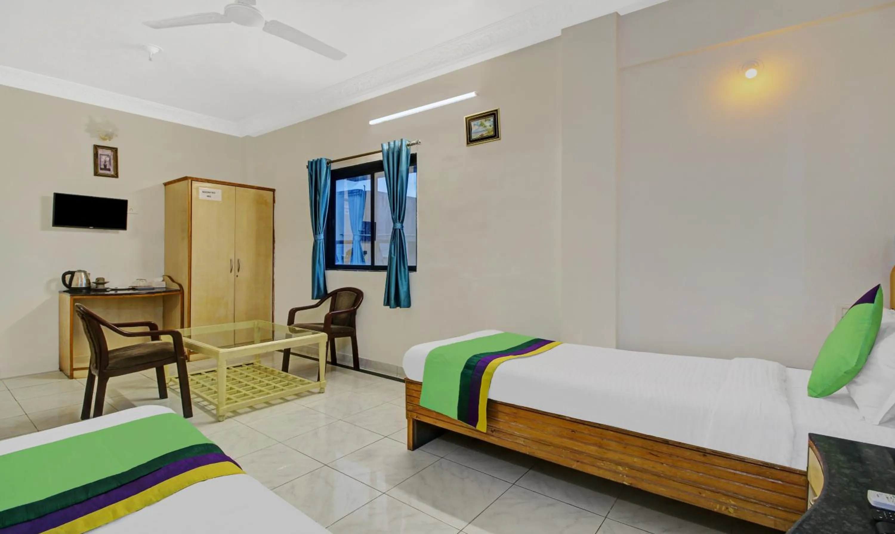 Bedroom, Bed in Treebo Eagle Executive