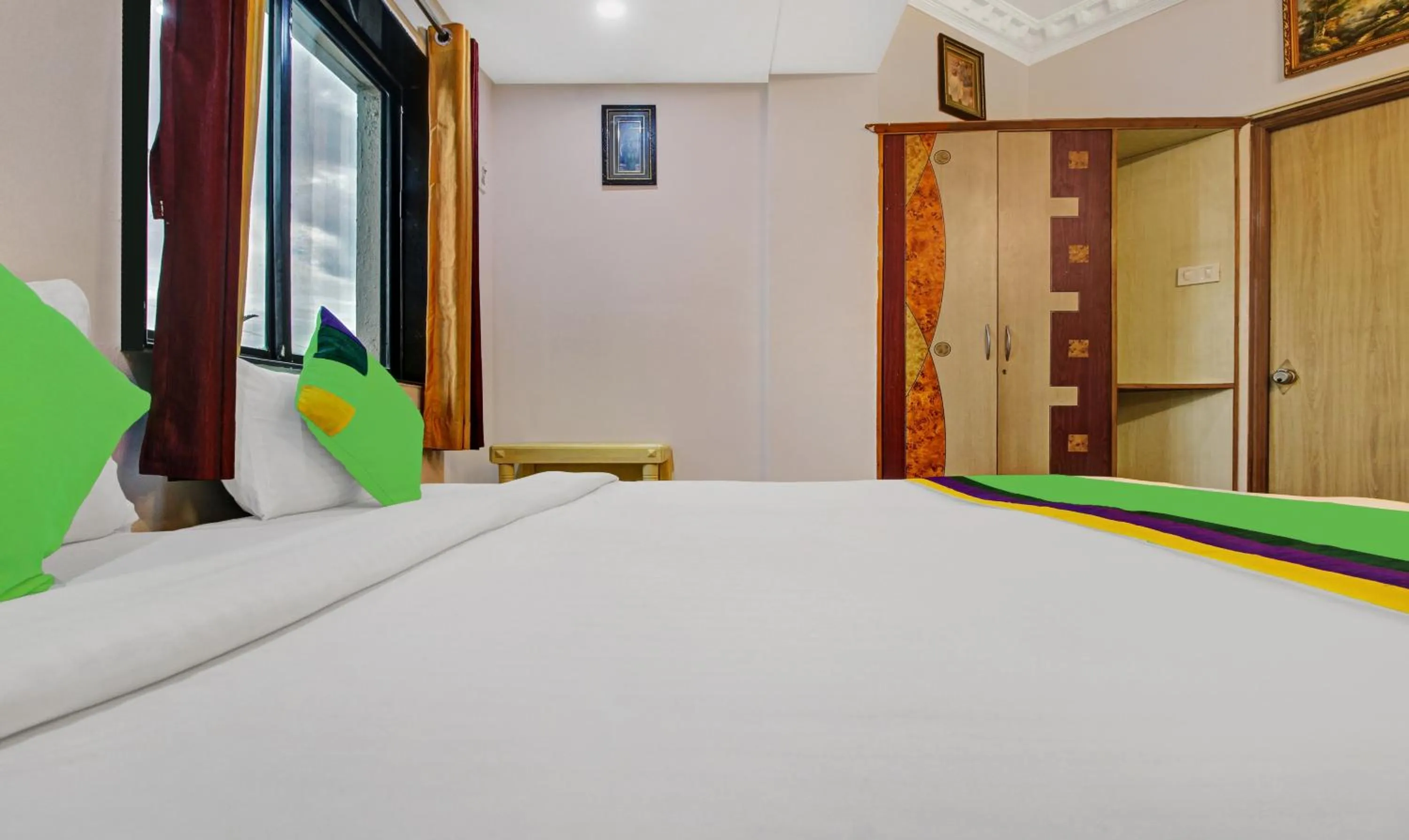 Bedroom, Bed in Treebo Eagle Executive