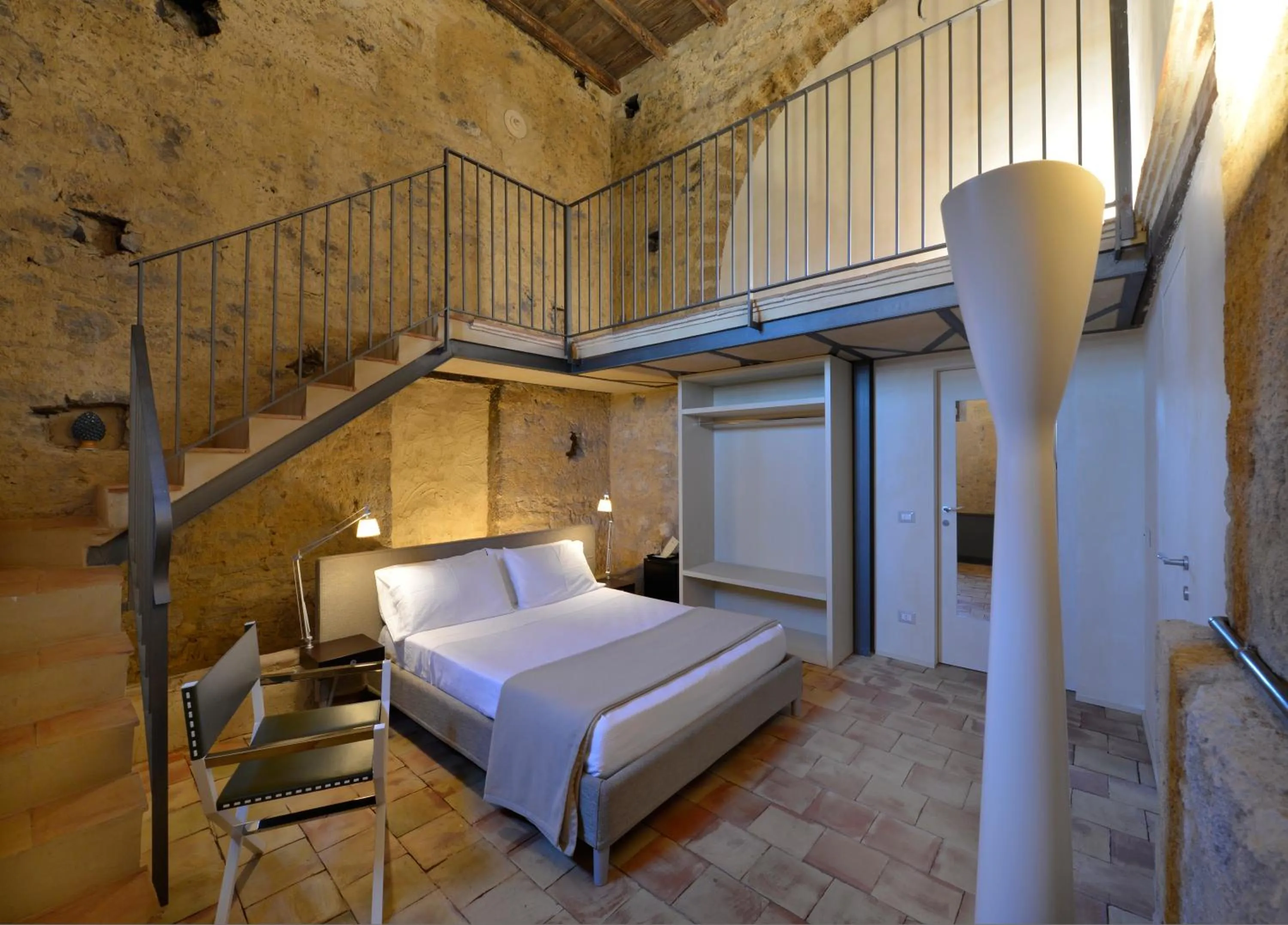Photo of the whole room, Bed in Wine Relais Feudi Del Pisciotto