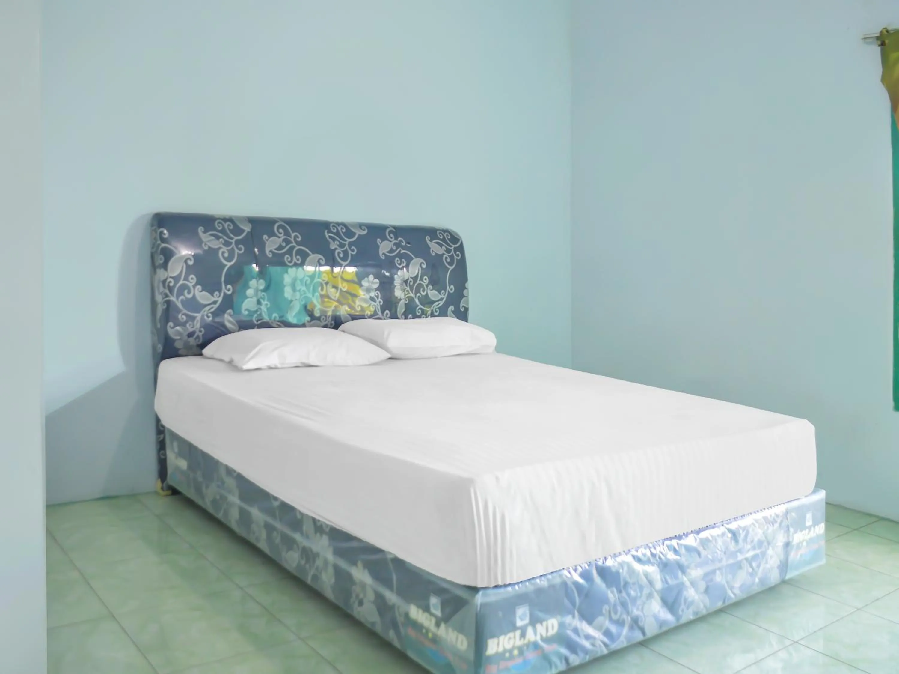 Bedroom in OYO 1745 Guest House Nur Aziziah Syariah 2